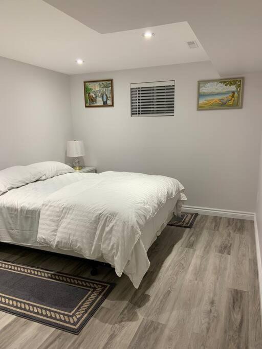 One bedroom in luxurious brand new ground level apartment