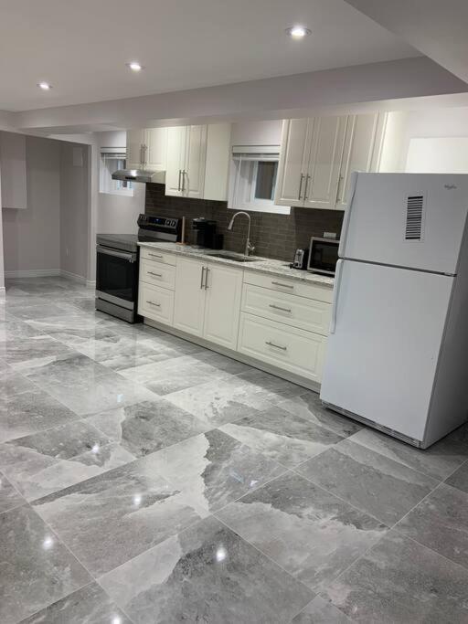 One bedroom in luxurious brand new ground level apartment