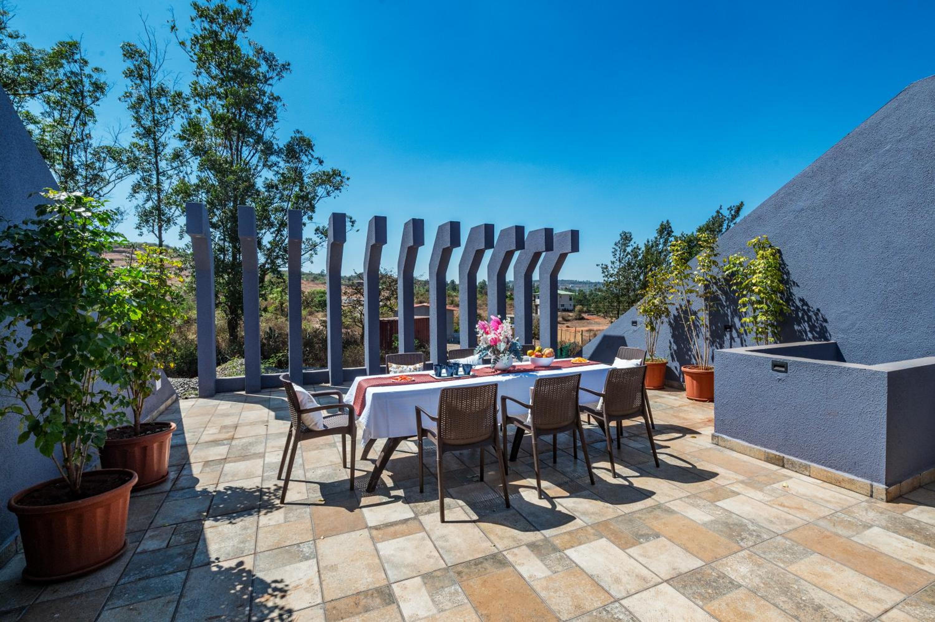 SaffronStays Blueberry - 4BR Panchgani villa with pool, bar lounge & terrace, lush garden vibes for family celebrations