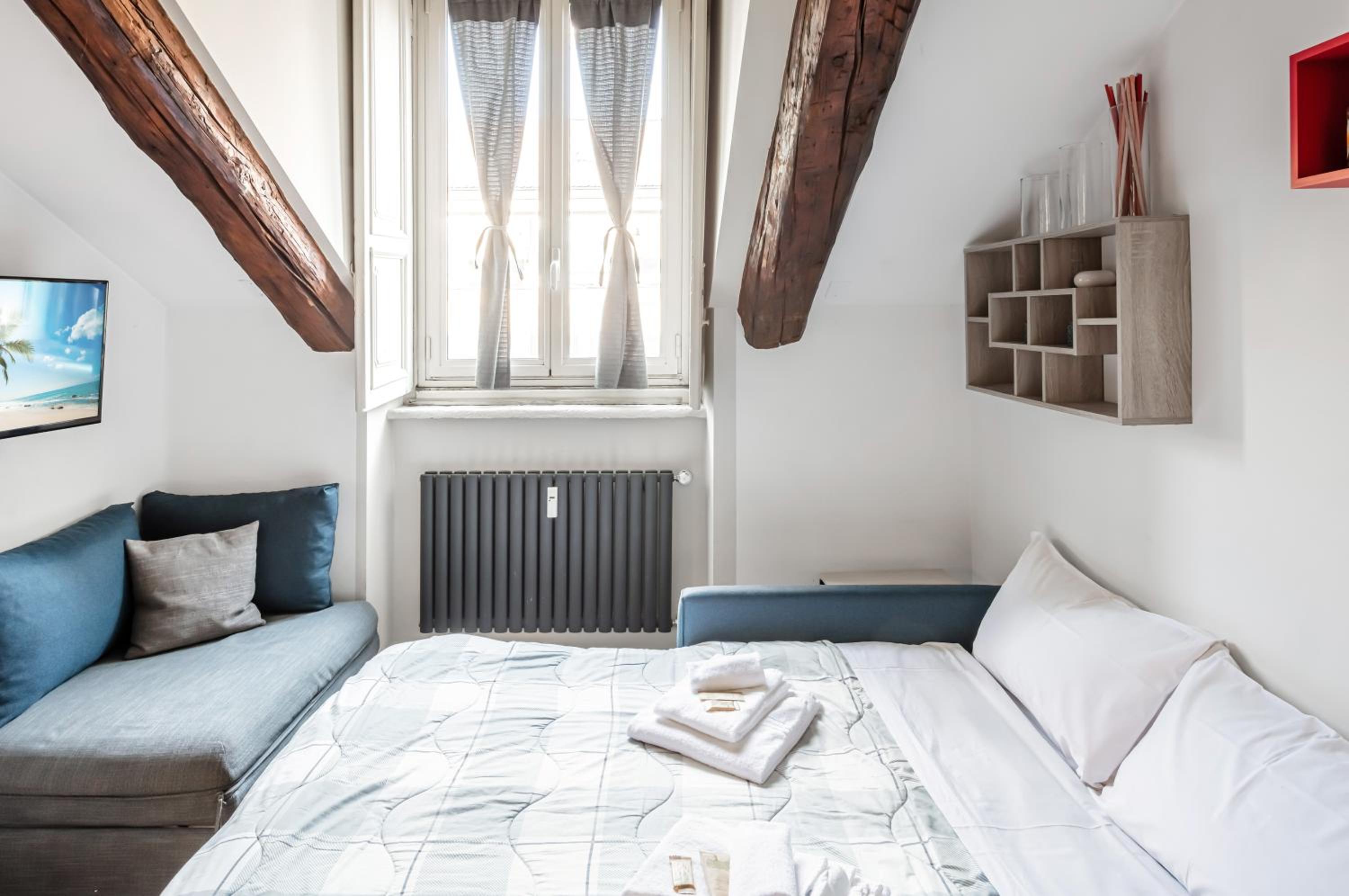 GuestHost - Piazza Castello Central Studio en Turin — hotel room