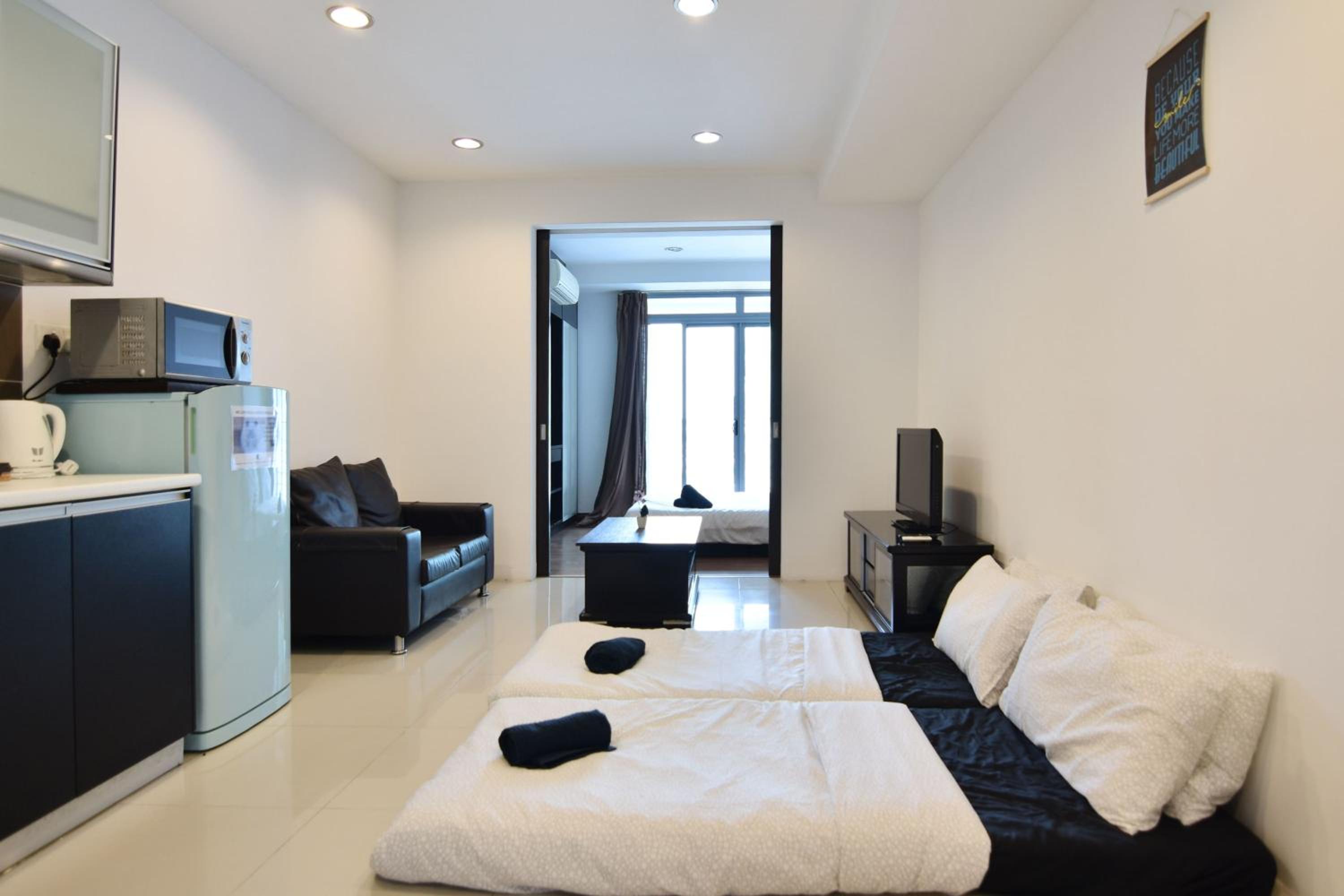 A Spacious & Cozy High-Floor 4BR Apt FREE Parking