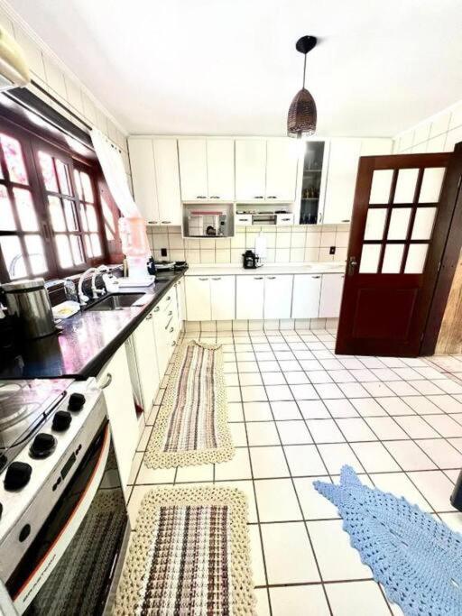 Casa luxuosa em Jd. Acapulco - Guarujá