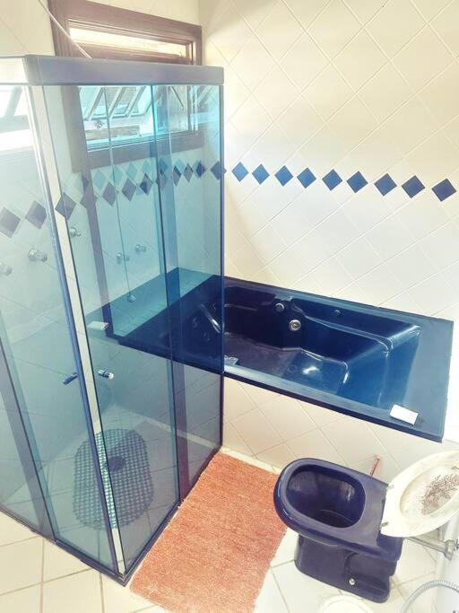 Casa luxuosa em Jd. Acapulco - Guarujá