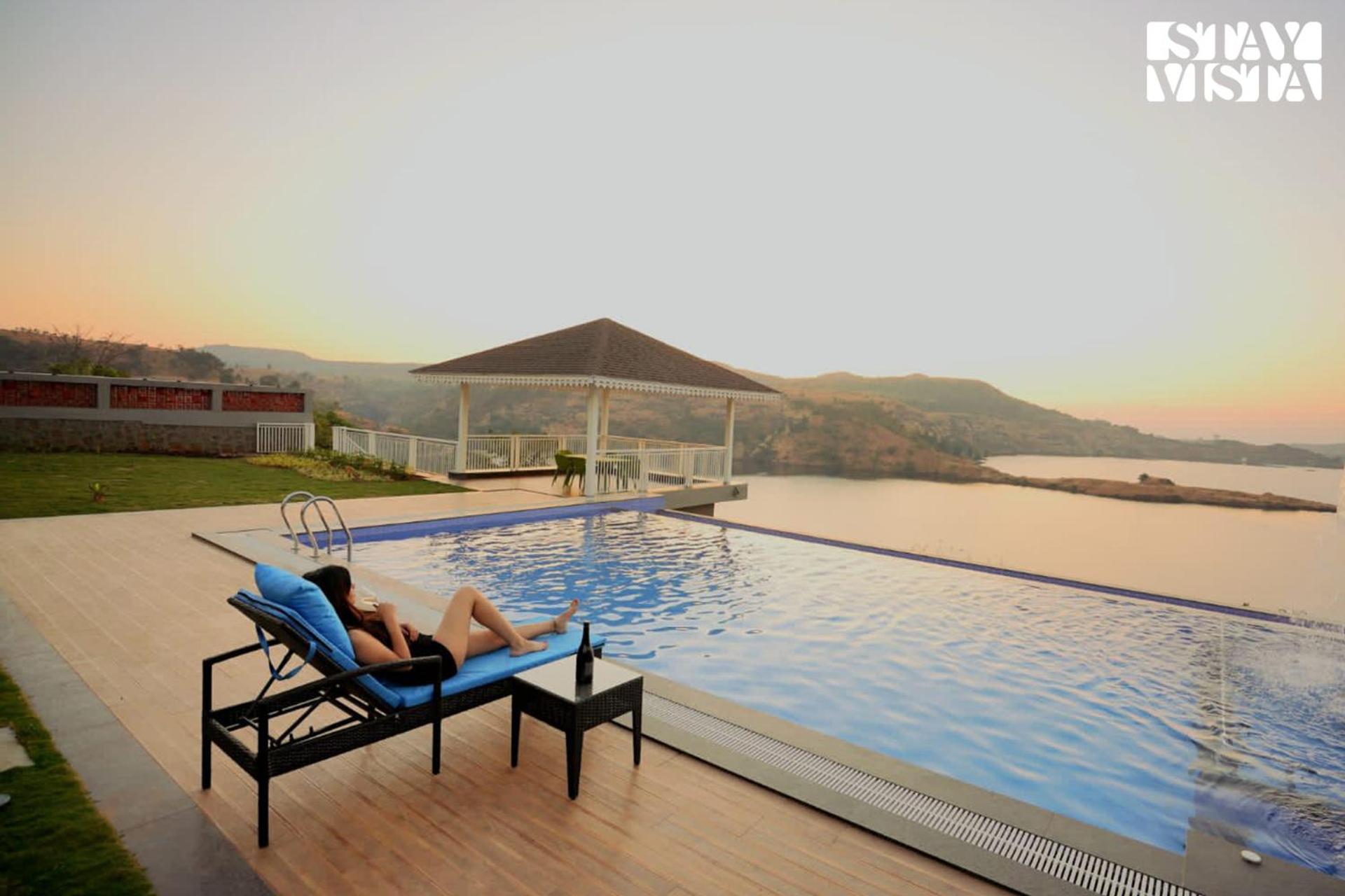 StayVista's The Aquamarine Villa - Igatpuri - Lakeside Retreat with Infinity Pool & Deck, Theatre Room & Gazebo view 2