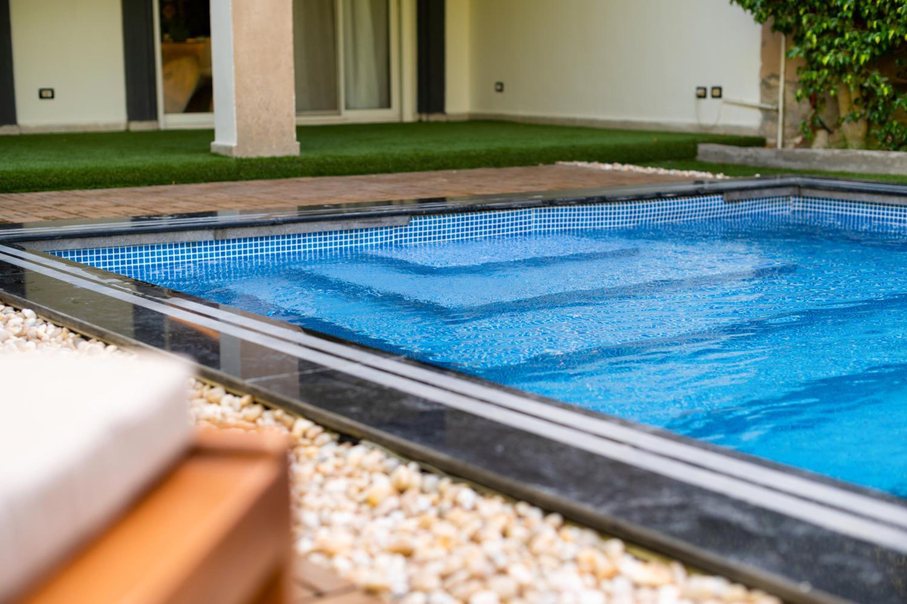 Zyra villa with pool and waterfall in New Cairo