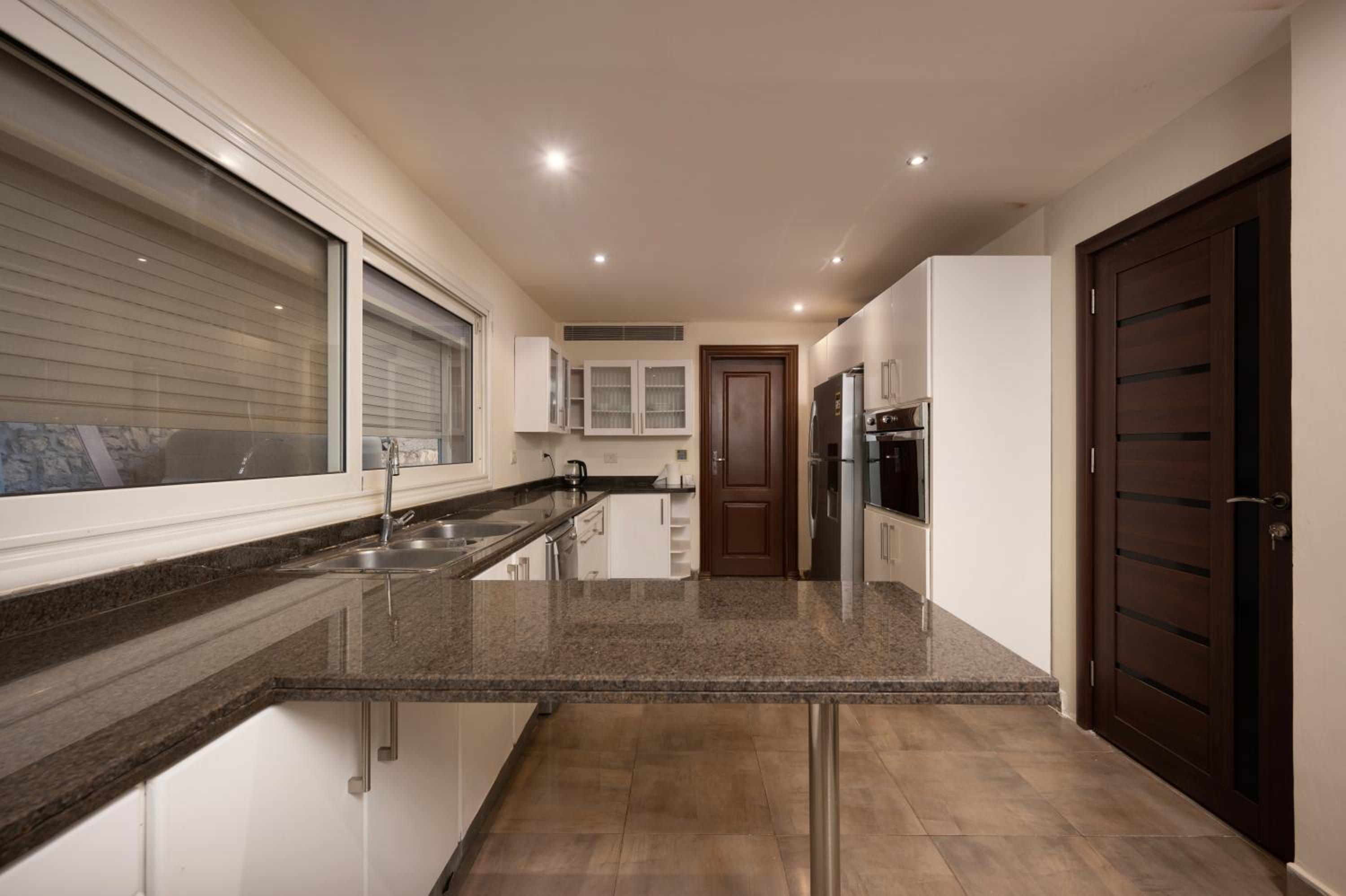 Zyra villa with pool and waterfall in New Cairo