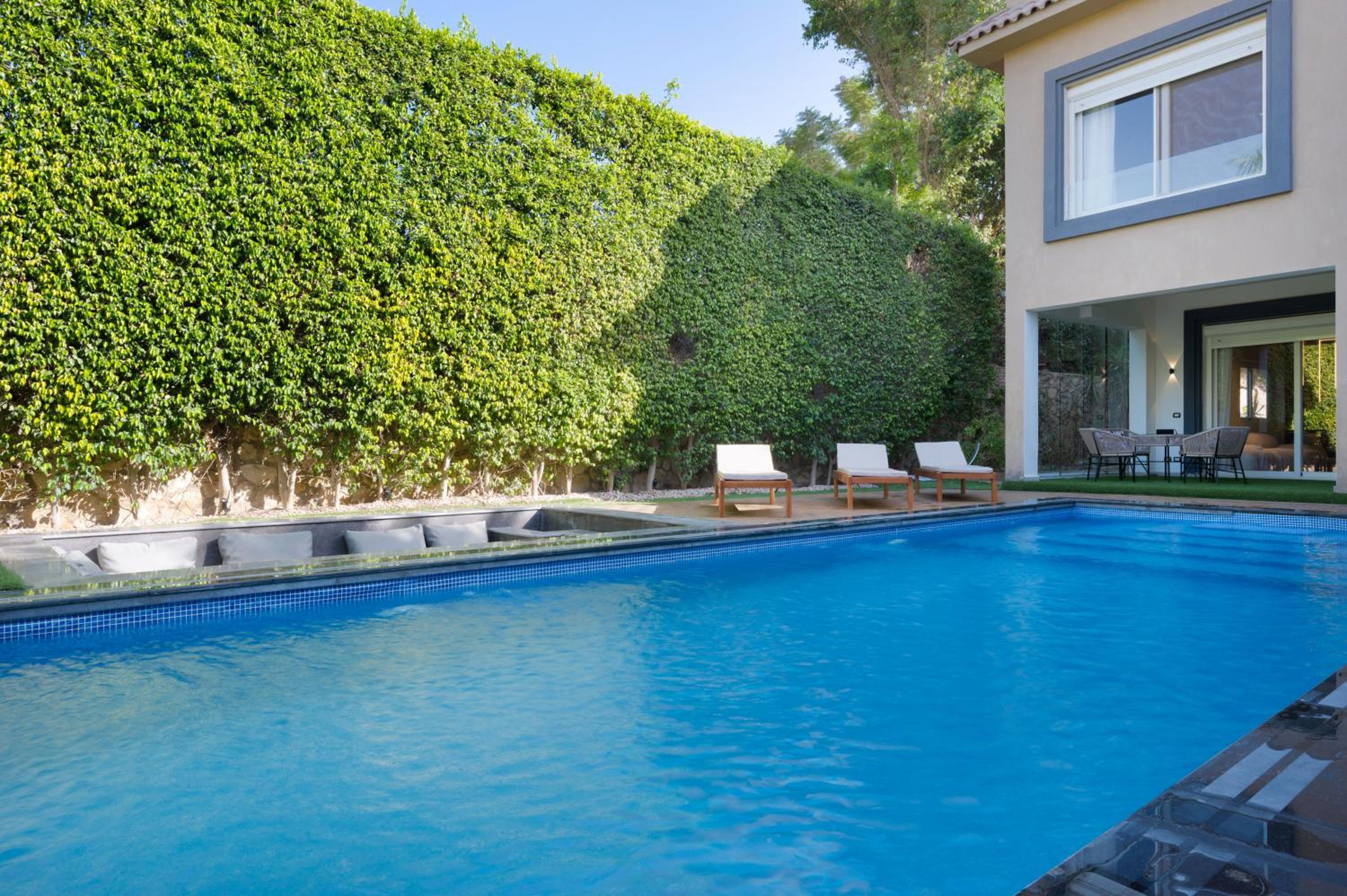 Zyra villa with pool and waterfall in New Cairo