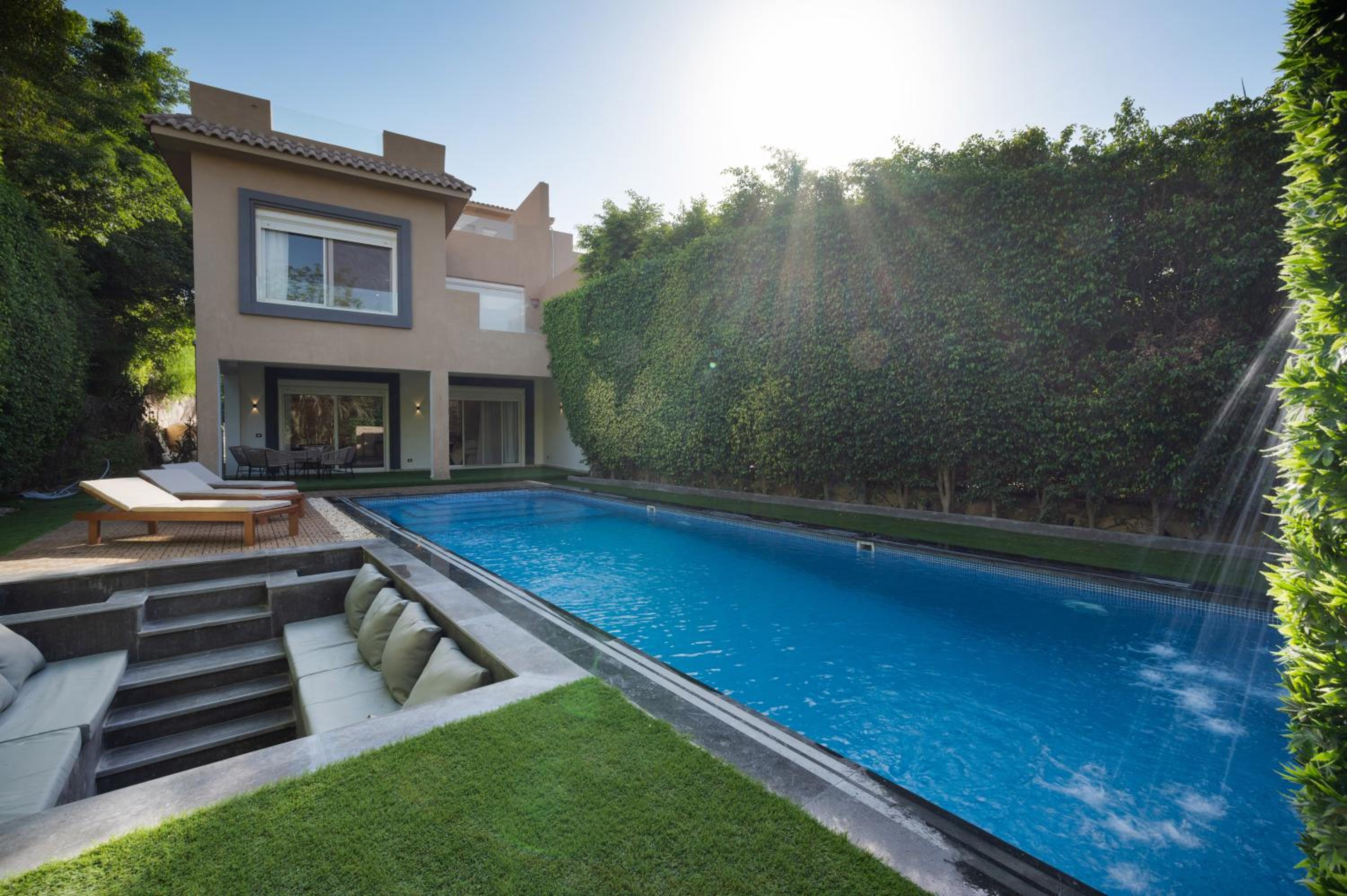 Zyra villa with pool and waterfall in New Cairo