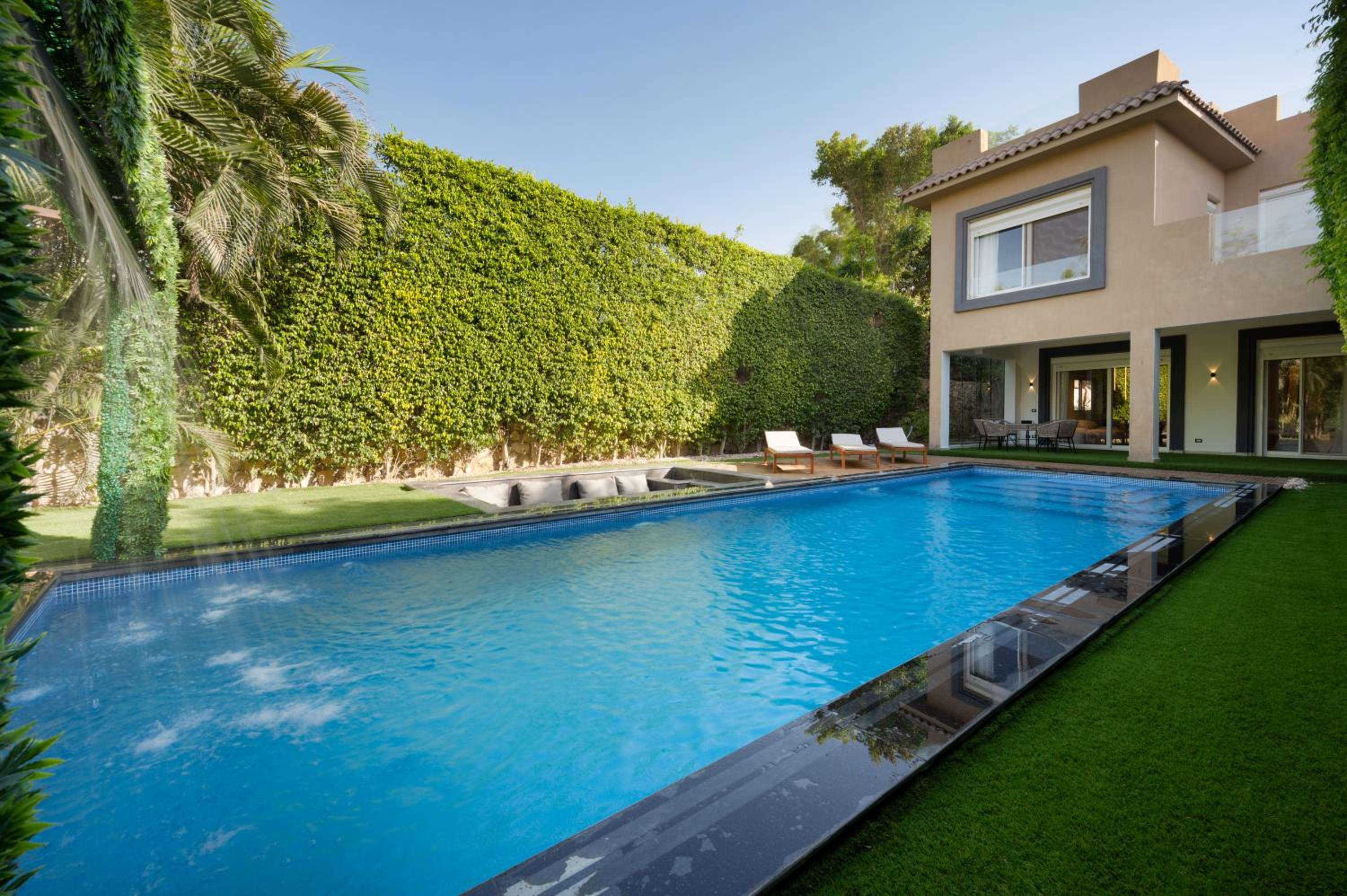 Zyra villa with pool and waterfall in New Cairo