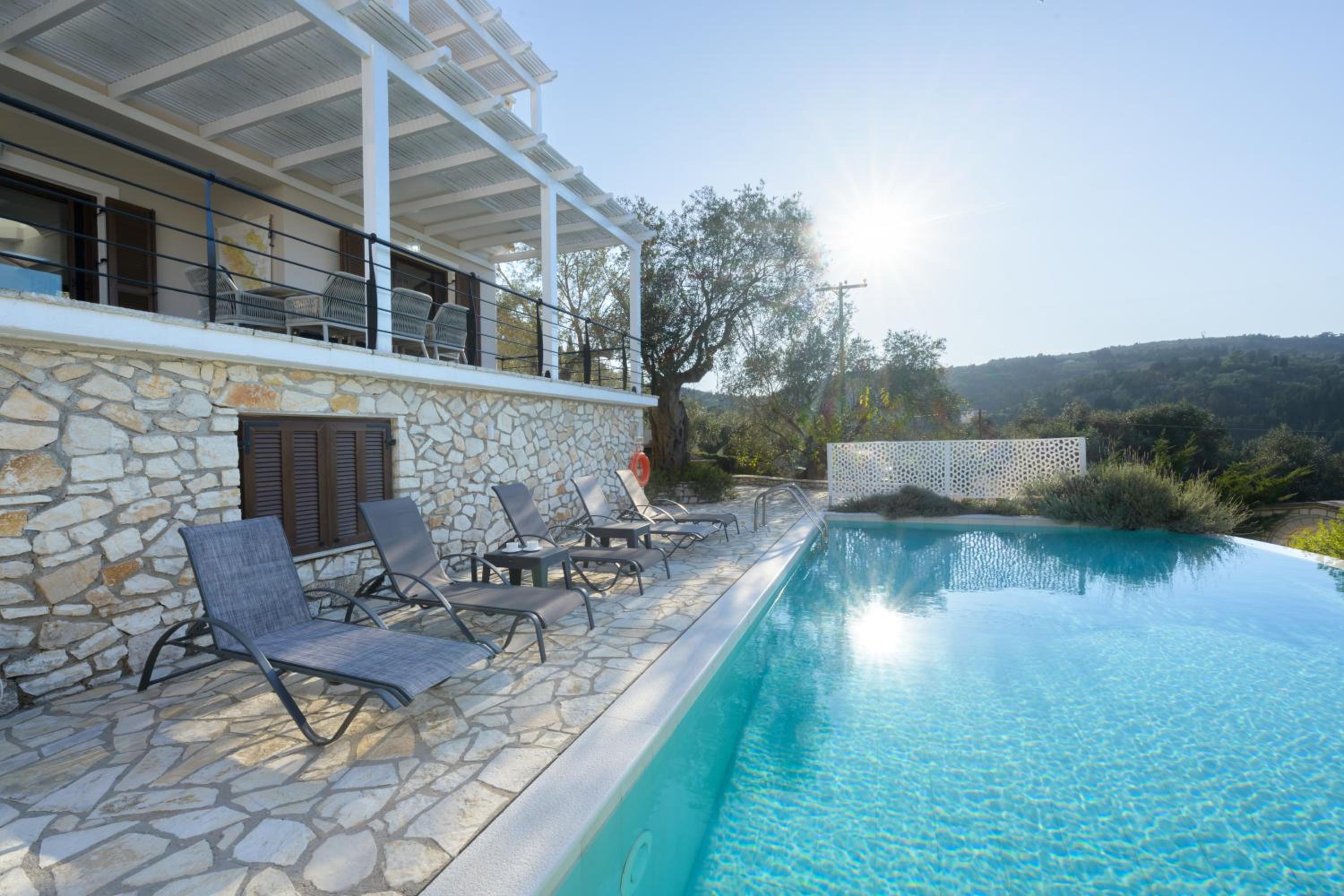 VILLA BOUGARINI Haven Family Villa Rock pool oasis view 3