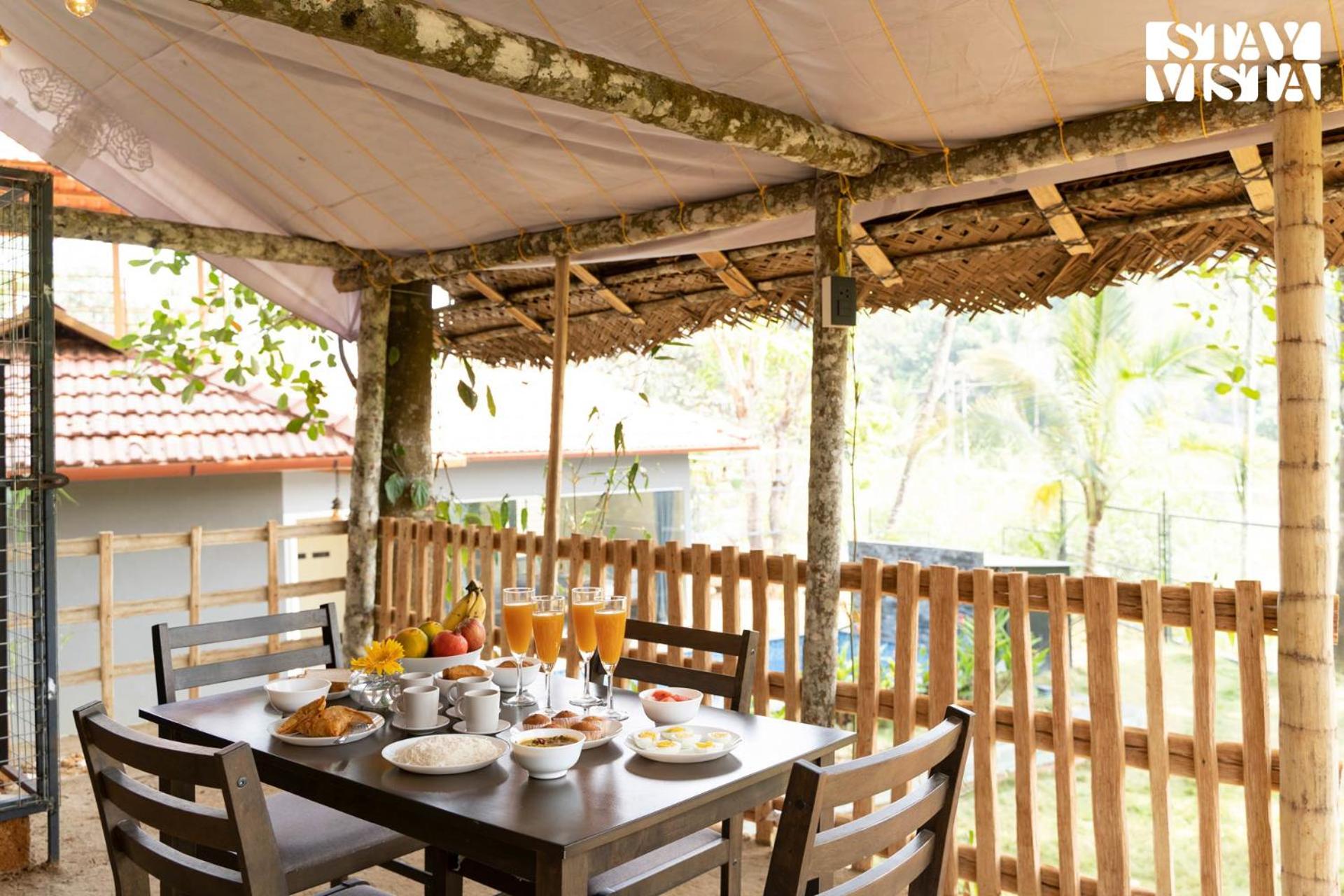StayVista at Palm Tree Homes with Complimentary Breakfast, BBQ Grill and Pet-Friendly Home