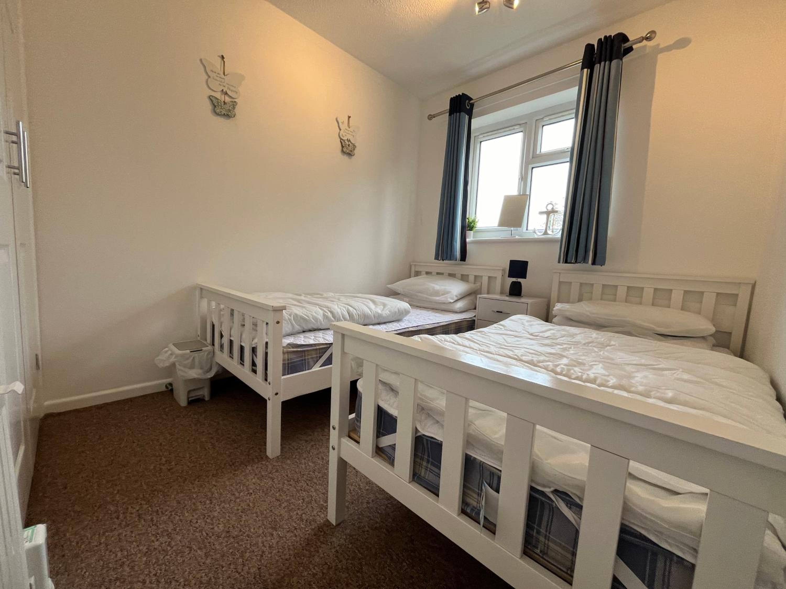 140, Three bed two storey chalet on Bermuda holiday park, Hemsby - Sleeps 6 on a pet free site - entertainment onsite and close by view 2