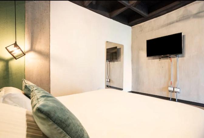 Dormitorios en Medellín con áreas comunes, Coworking - Be Together by Roots Rentals TOG HAB