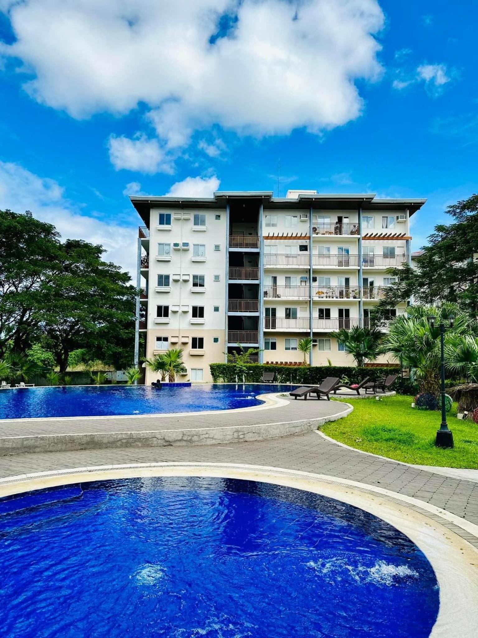 Amaia Steps Nuvali fully furnished unit with swimming pool view near Carmelray Pitland