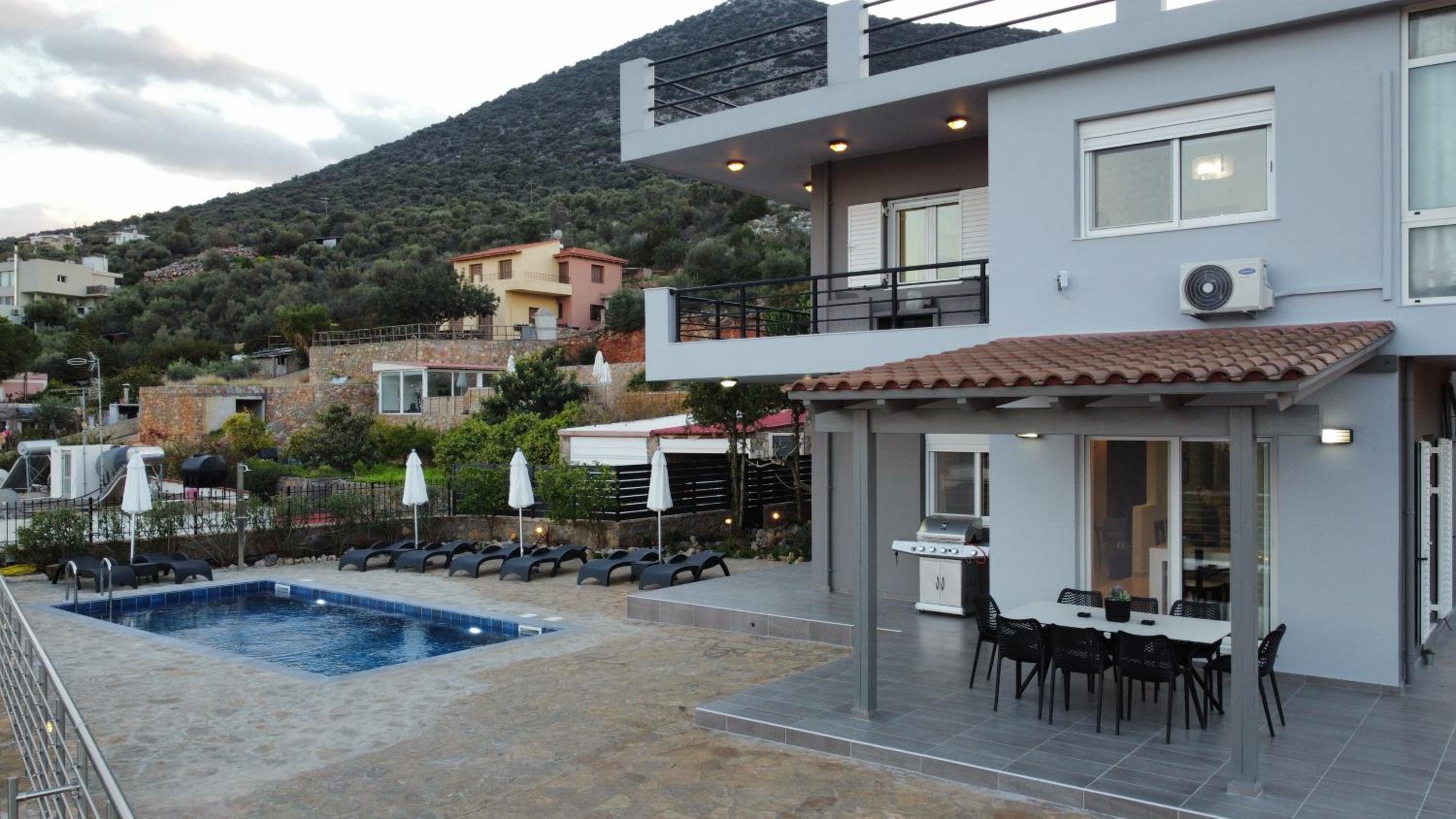 Villa Eleftheria with heated pool view 2