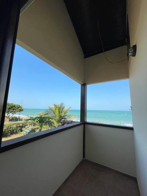 Casa de Vidro Pé na Areia
