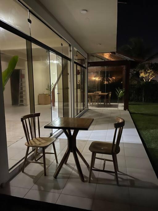 Casa de Vidro Pé na Areia