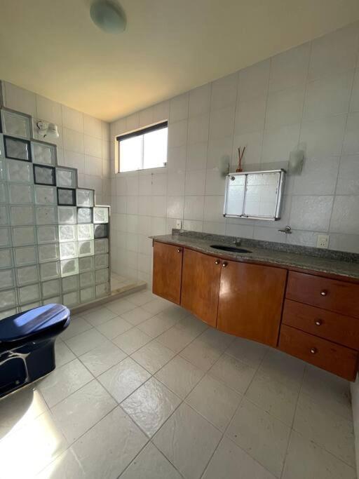Casa de Vidro Pé na Areia