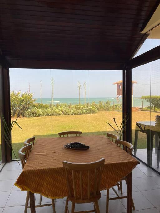 Casa de Vidro Pé na Areia