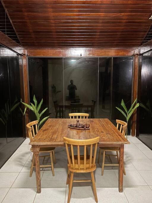 Casa de Vidro Pé na Areia