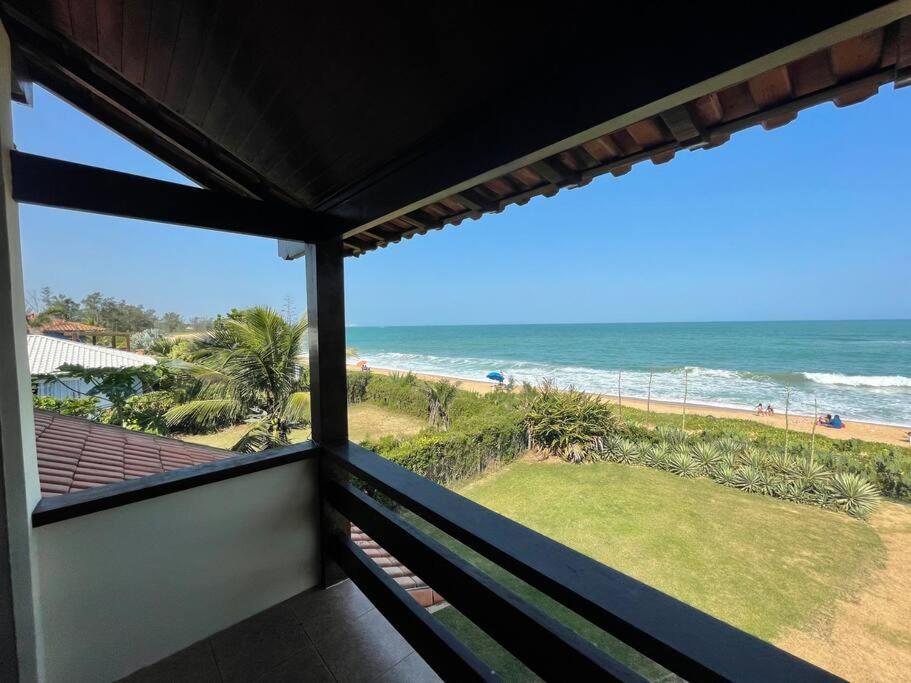 Casa de Vidro Pé na Areia