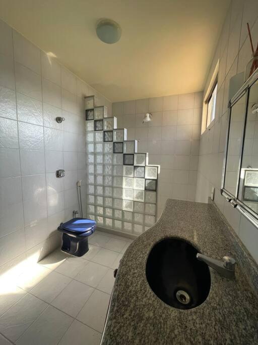 Casa de Vidro Pé na Areia