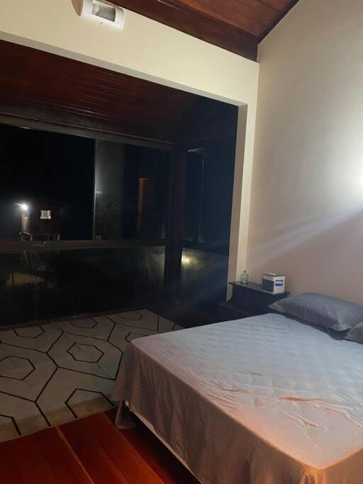 Casa de Vidro Pé na Areia