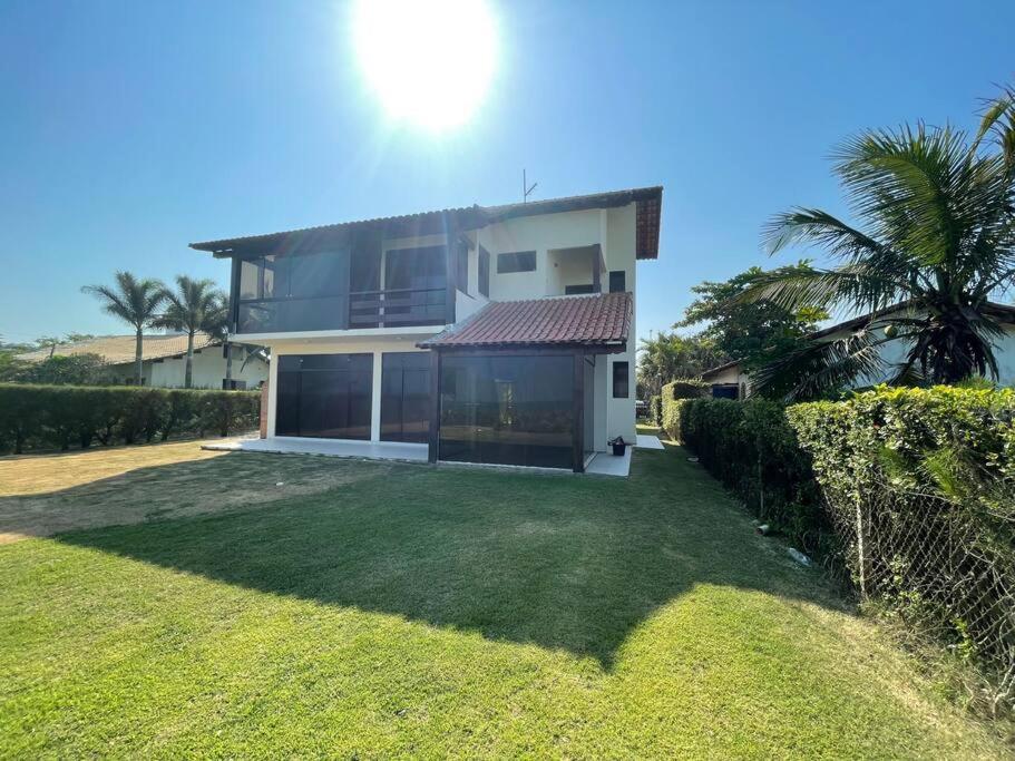 Casa de Vidro Pé na Areia