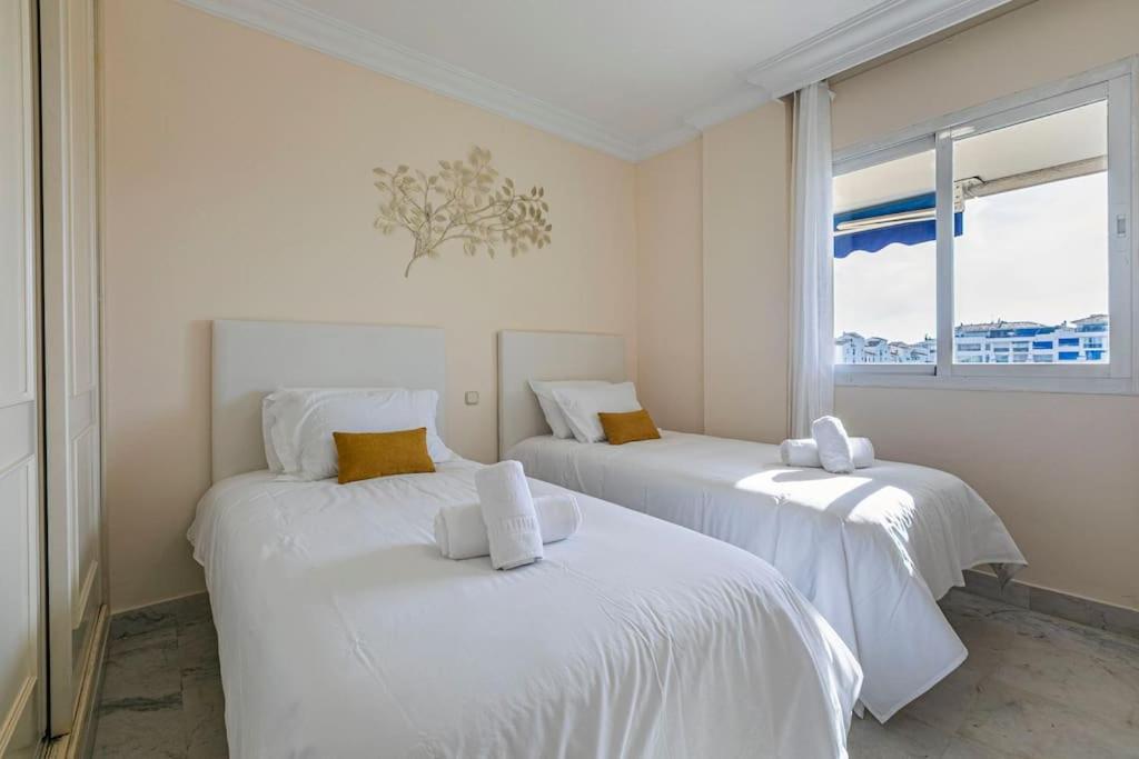 MARBELLA HOME RENTALS - Marina Banus, Puerto Banus, 2BR Modern, parking & pool