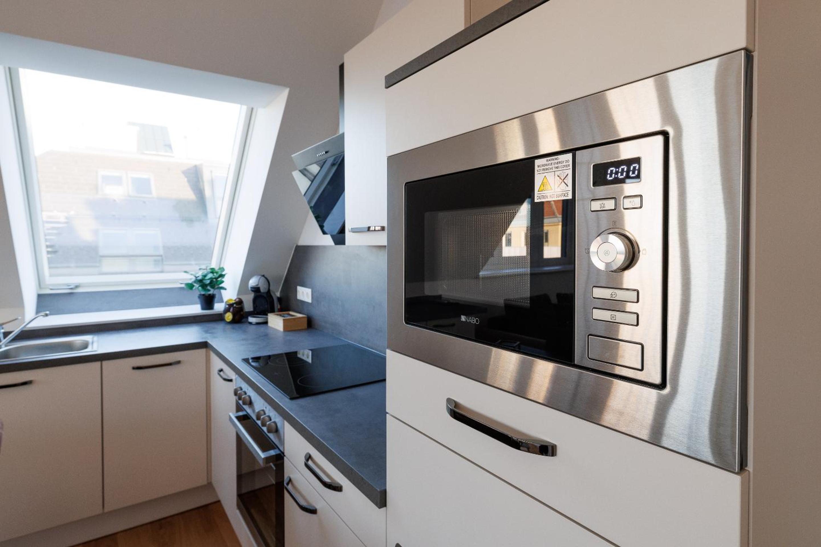 SYMPHONY Apartments 40 - Modern Loft with Terrace and Grill in Central Location