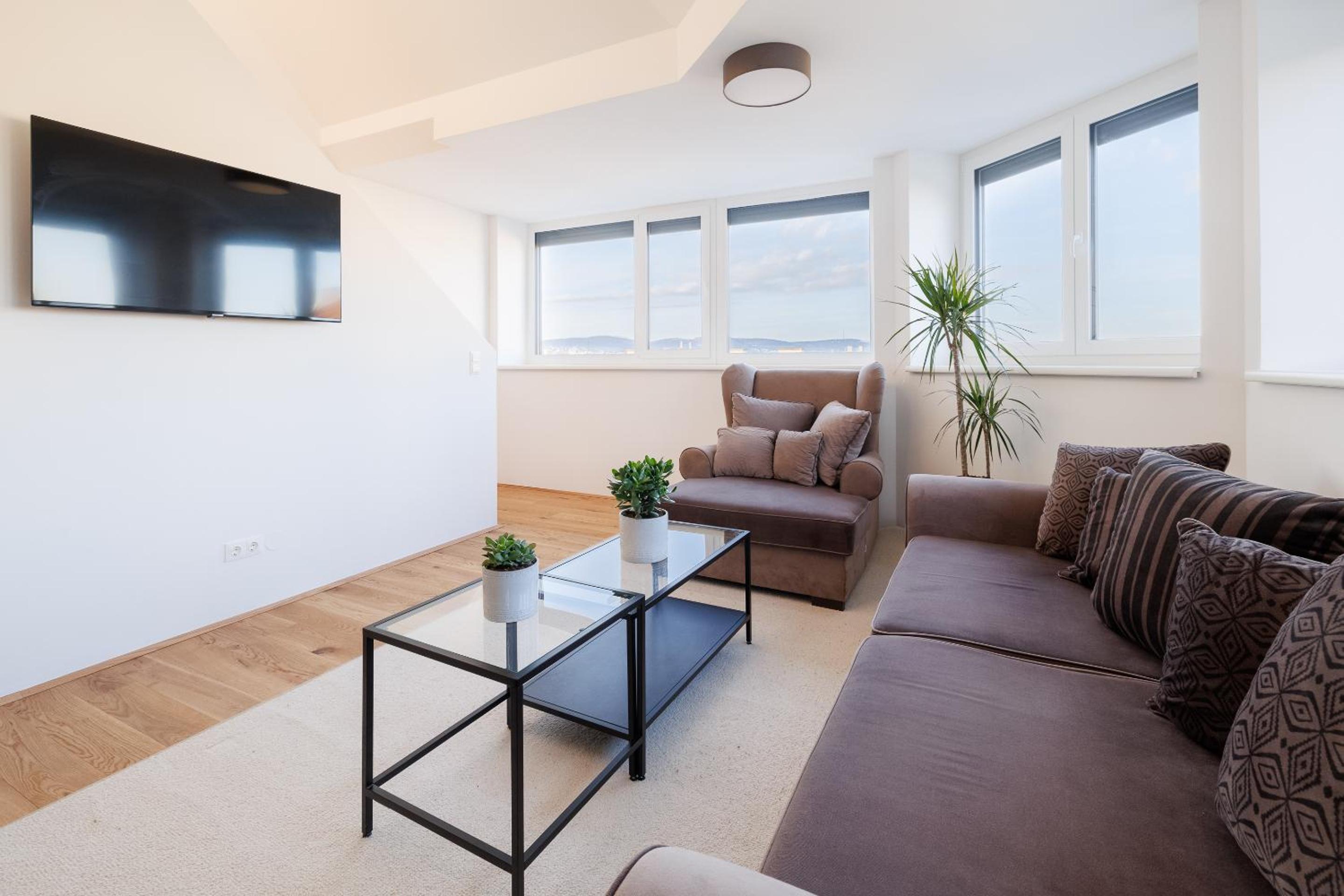 SYMPHONY Apartments 40 - Modern Loft with Terrace and Grill in Central Location