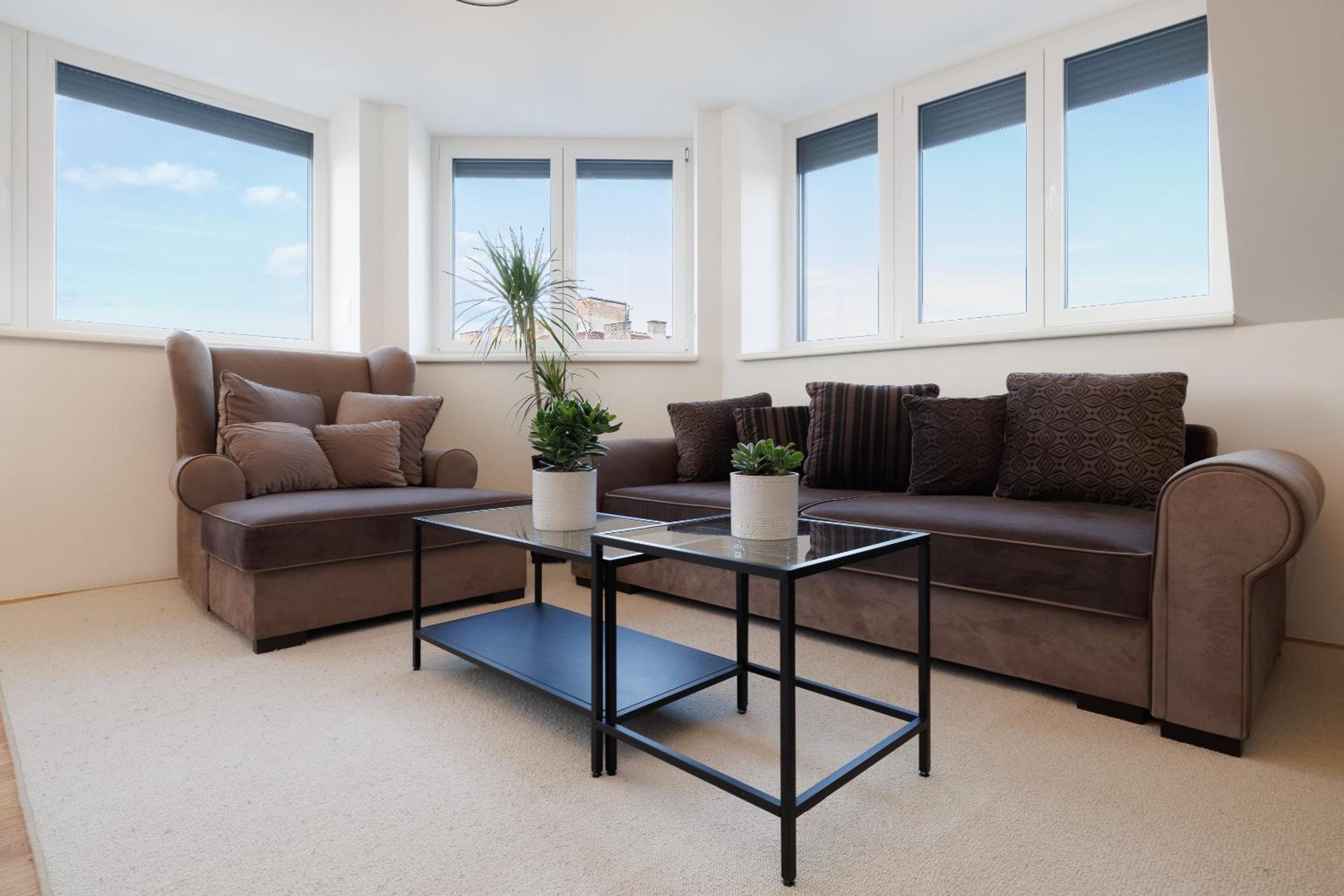 SYMPHONY Apartments 40 - Modern Loft with Terrace and Grill in Central Location