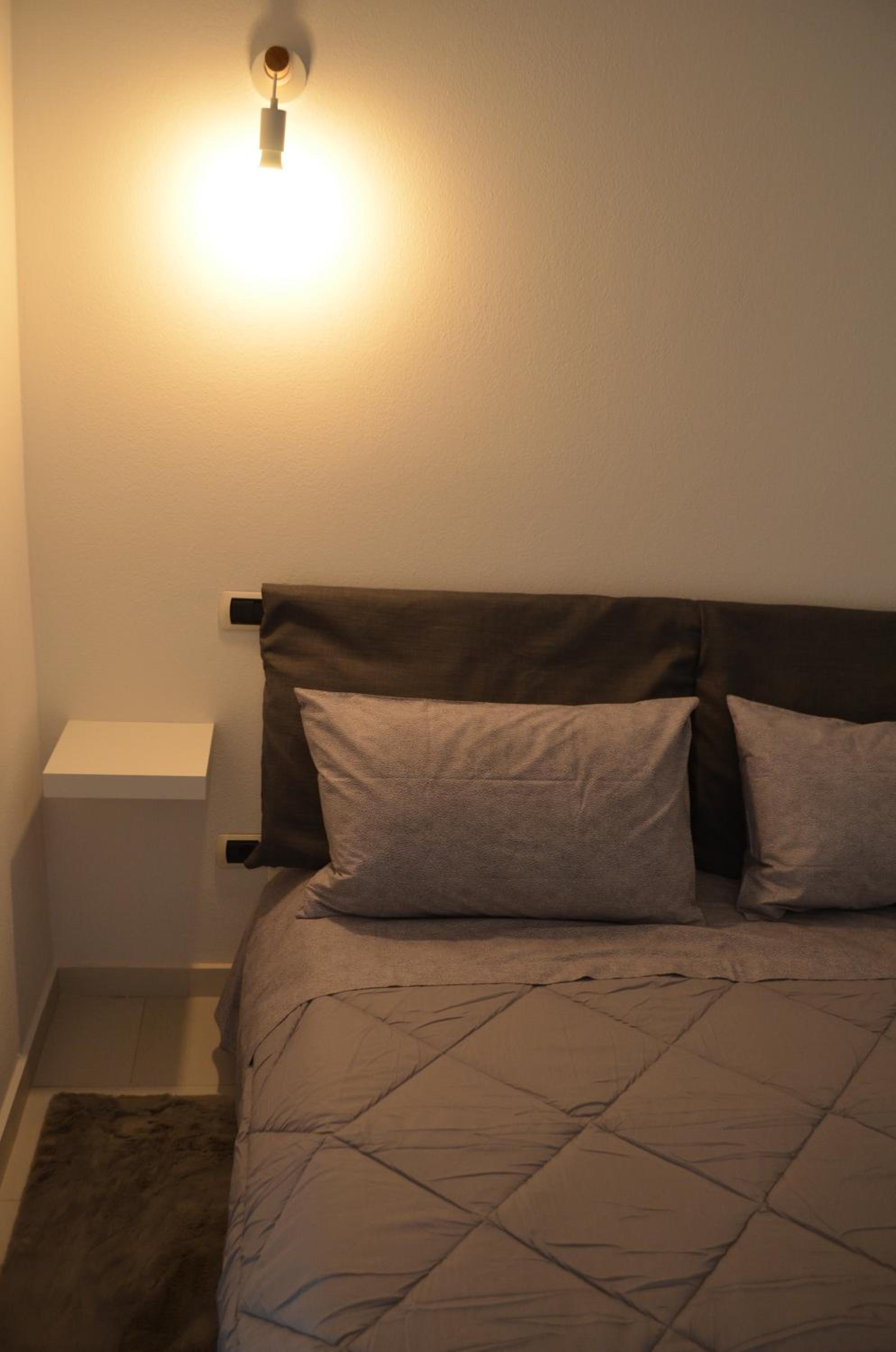 Da Nonna Lù en Quartu SantʼElena — bedroom