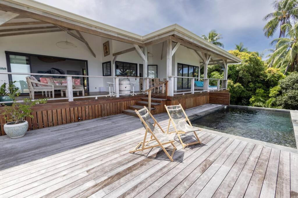 2 BR. Panoramic Lagoon View Villa: Poolside paradise, gourmet kitchen view 3