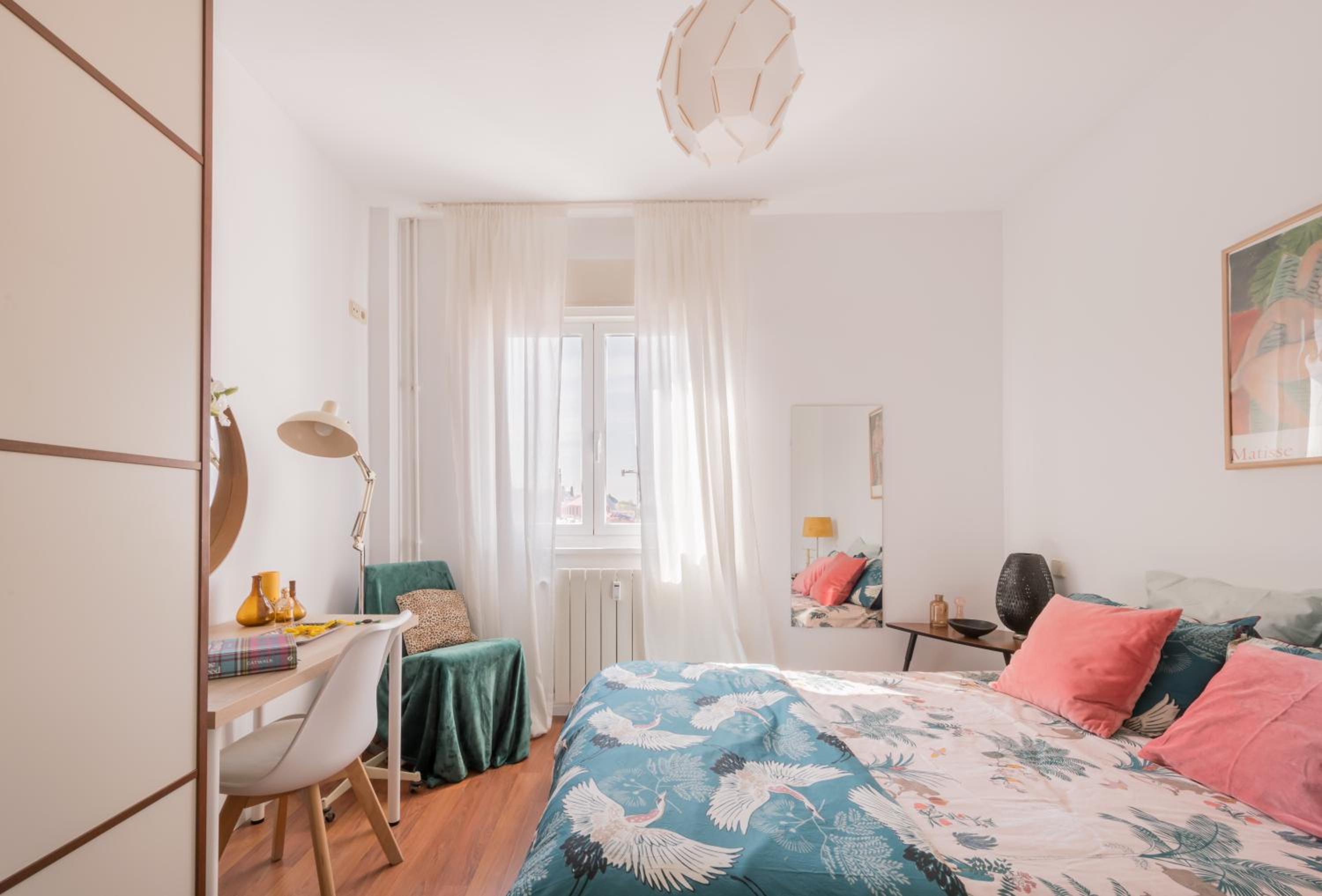 Cozy and Stylish Room with Natural Light and Vibrant Decor