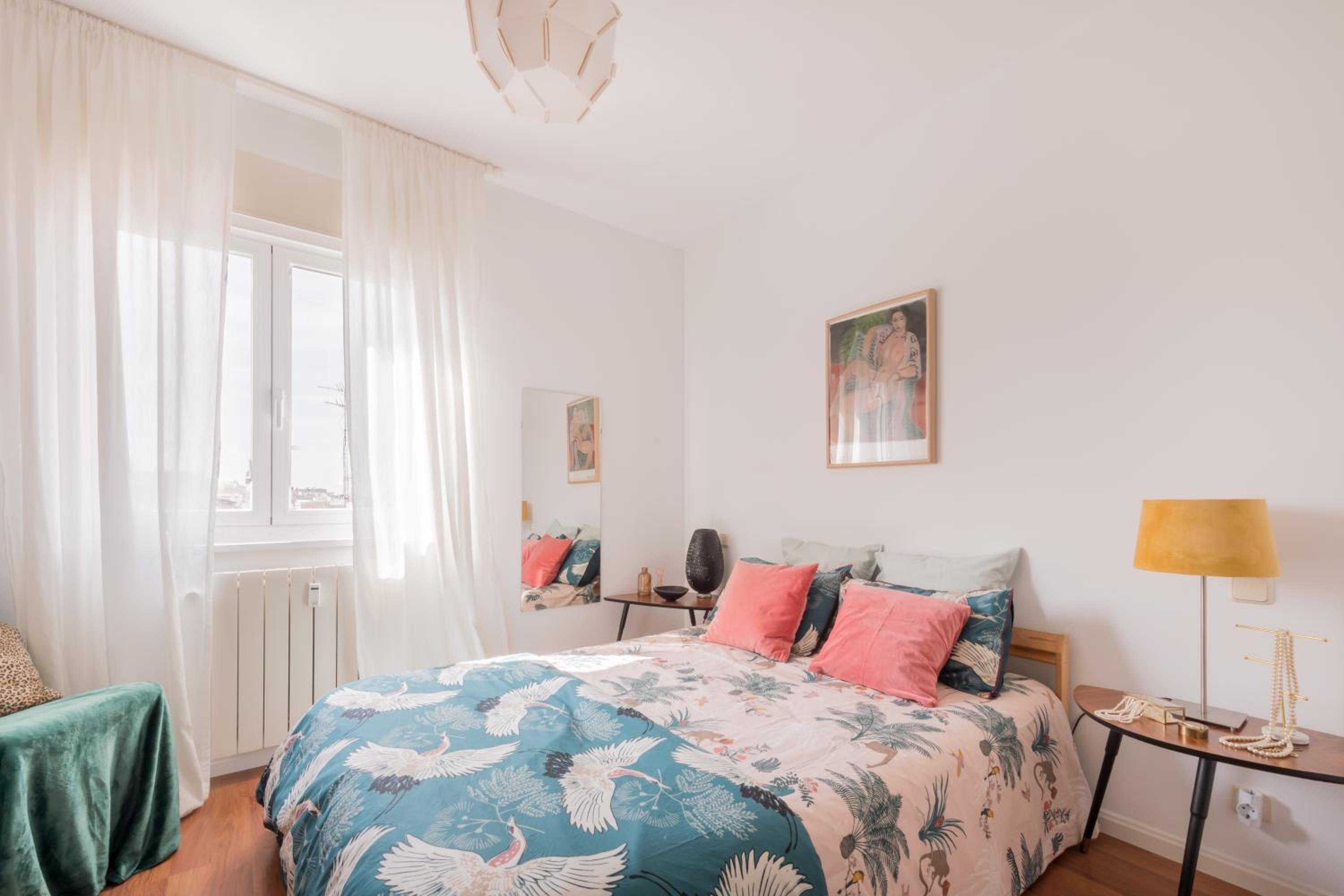 Cozy and Stylish Room with Natural Light and Vibrant Decor