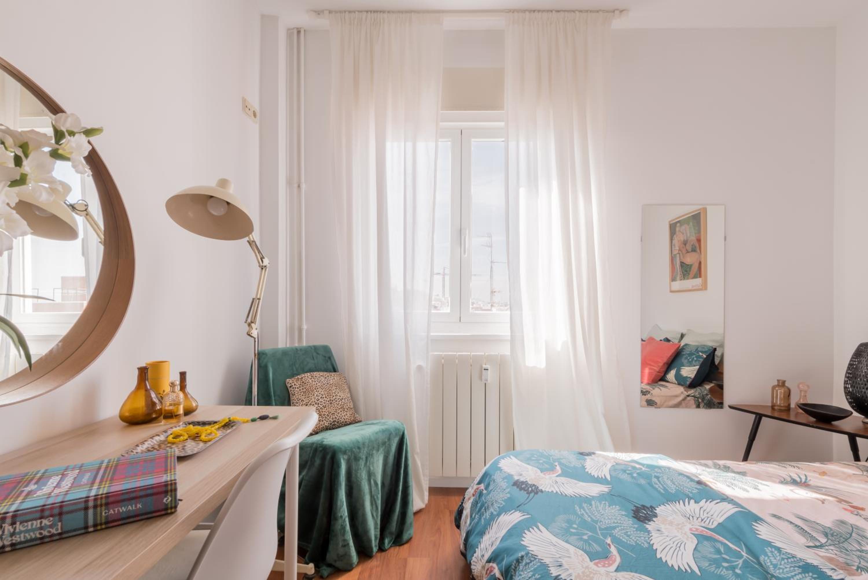 Cozy and Stylish Room with Natural Light and Vibrant Decor