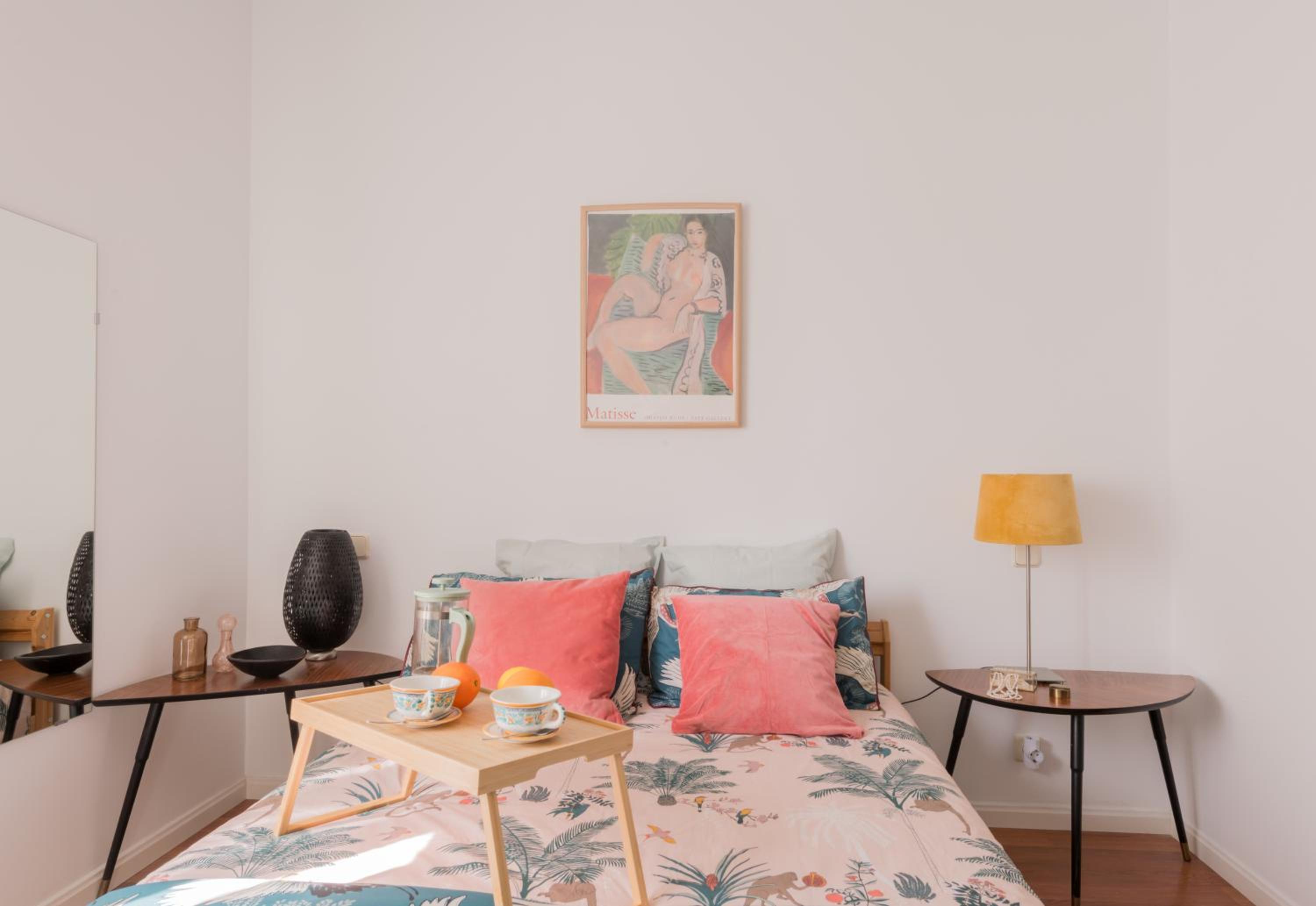 Cozy and Stylish Room with Natural Light and Vibrant Decor