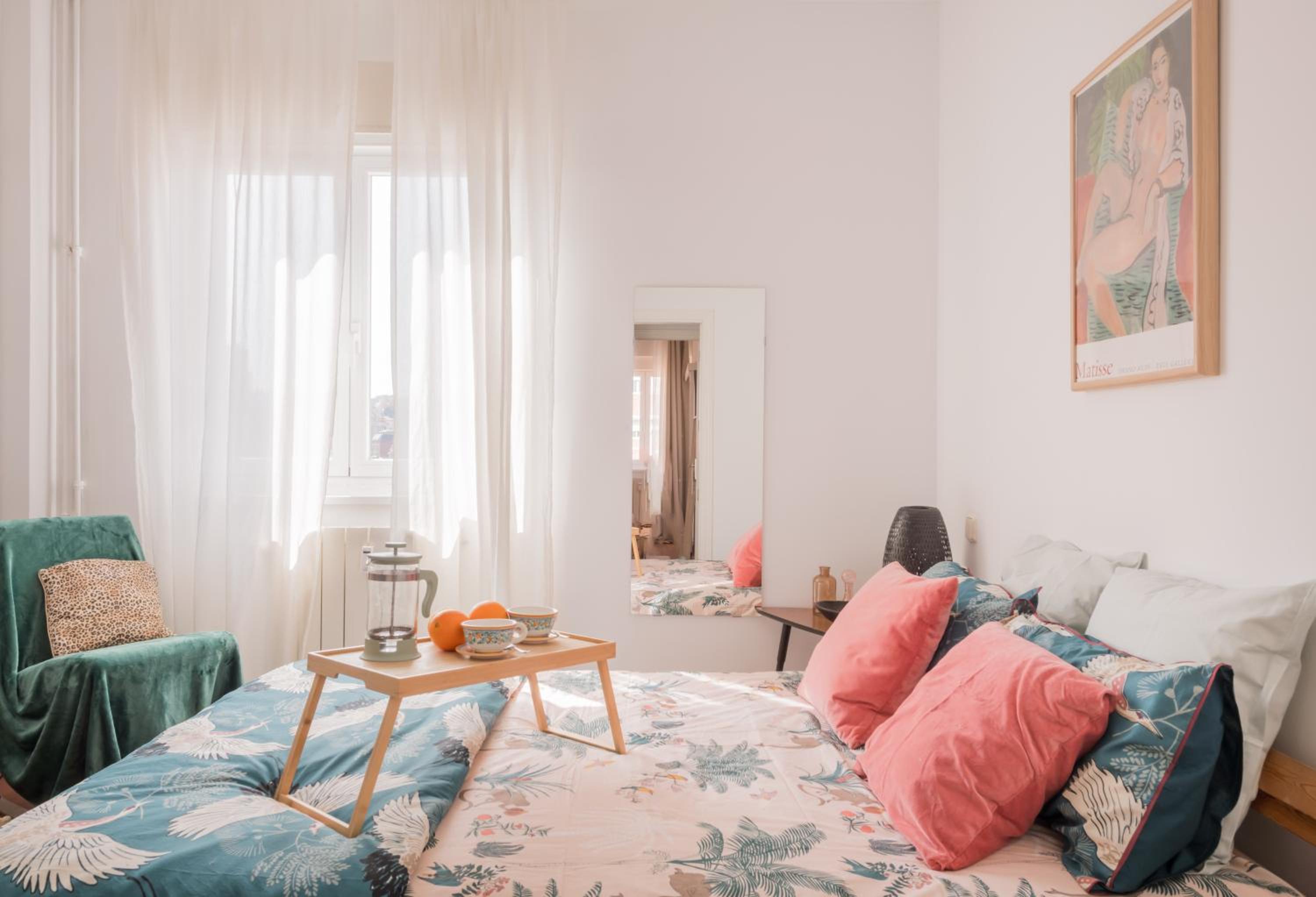 Cozy and Stylish Room with Natural Light and Vibrant Decor