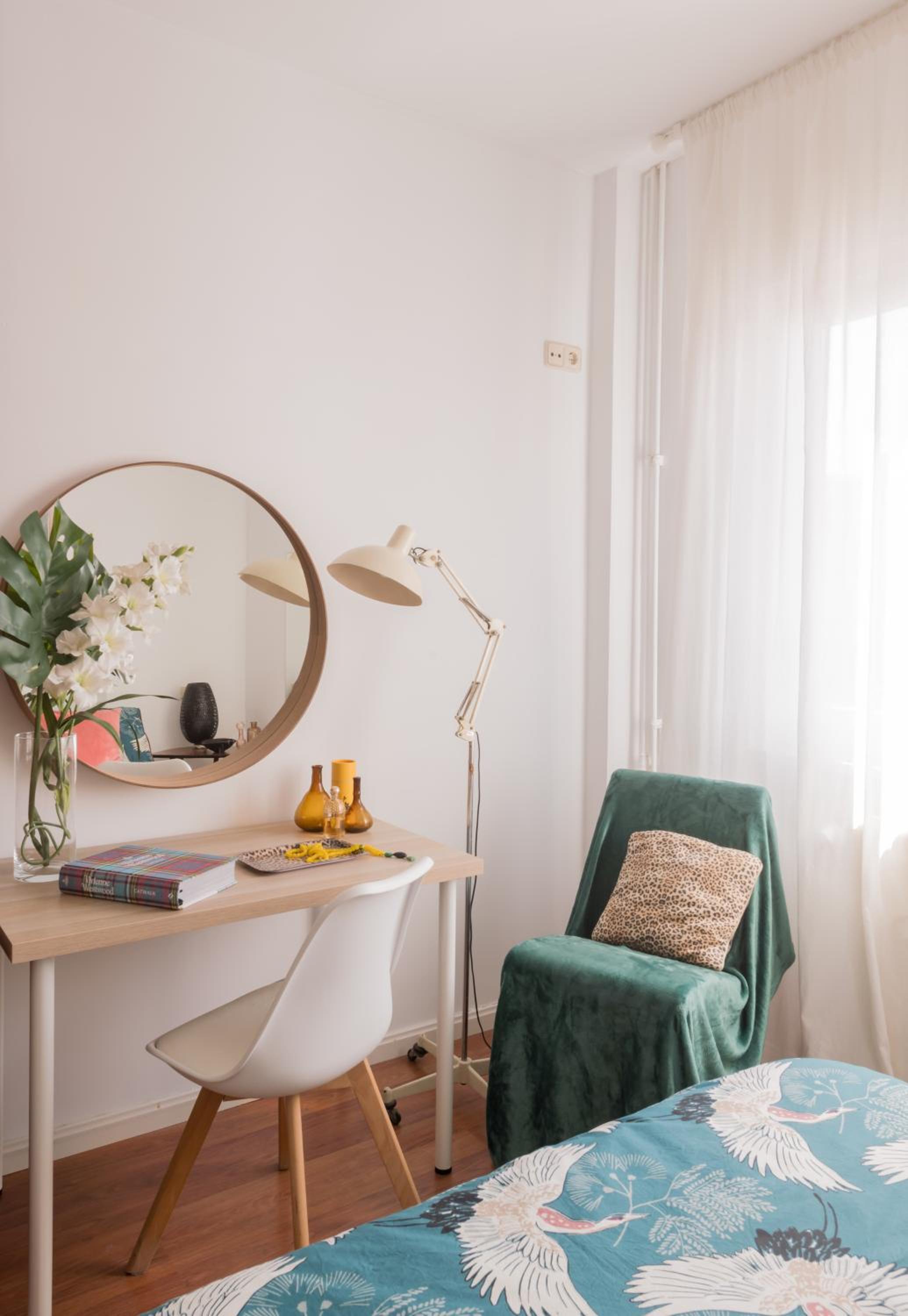 Cozy and Stylish Room with Natural Light and Vibrant Decor