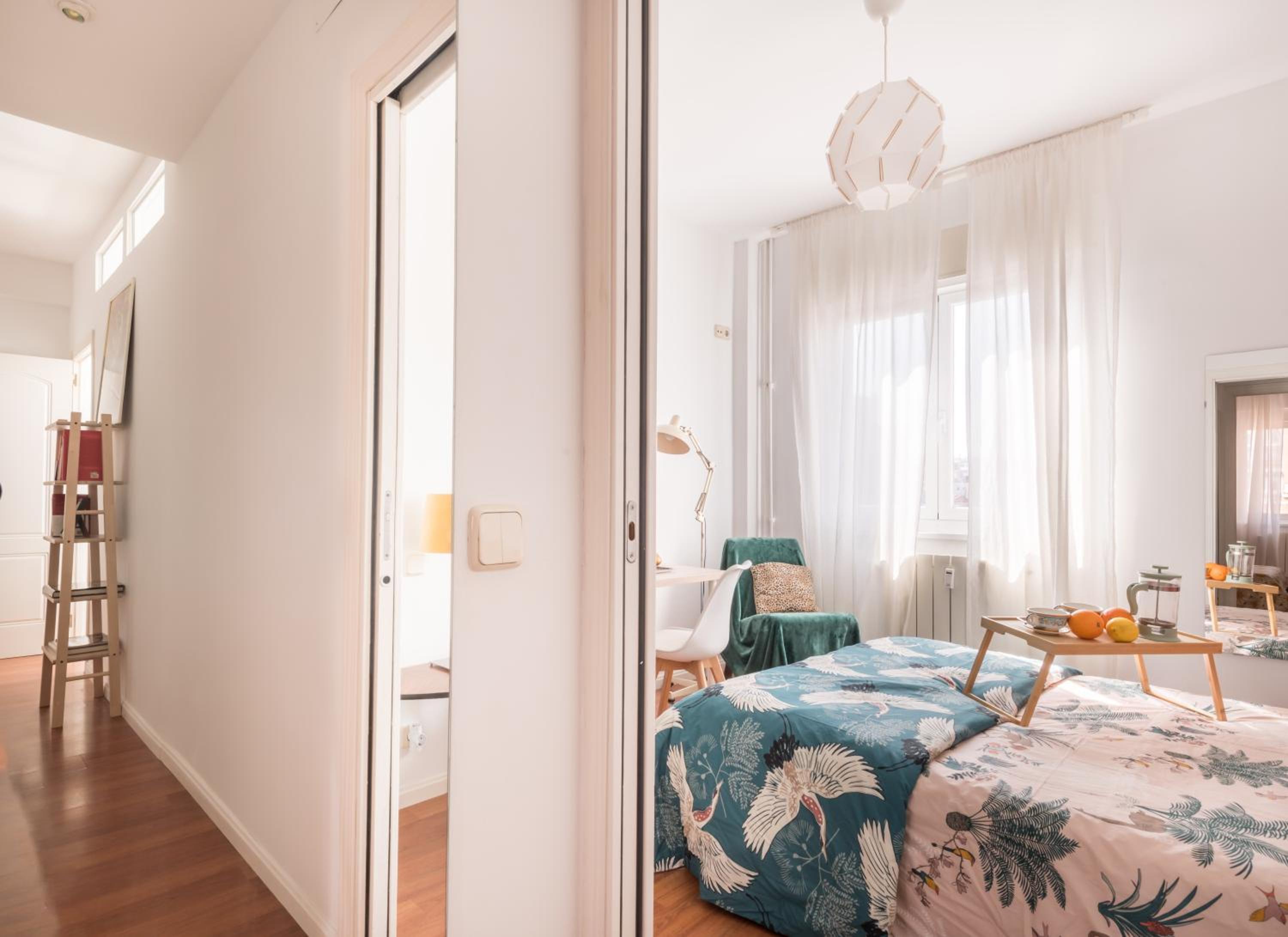 Cozy and Stylish Room with Natural Light and Vibrant Decor