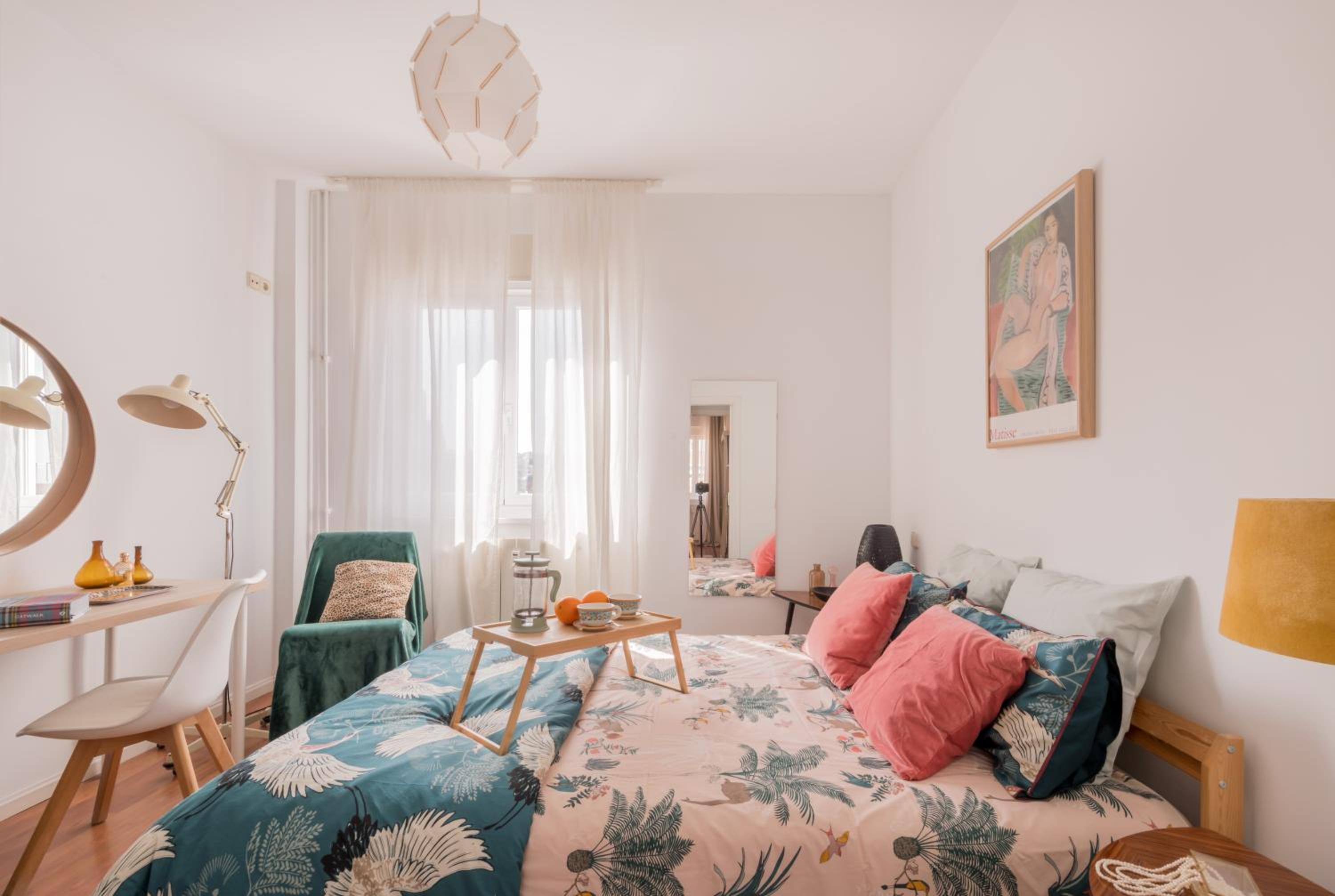 Cozy and Stylish Room with Natural Light and Vibrant Decor