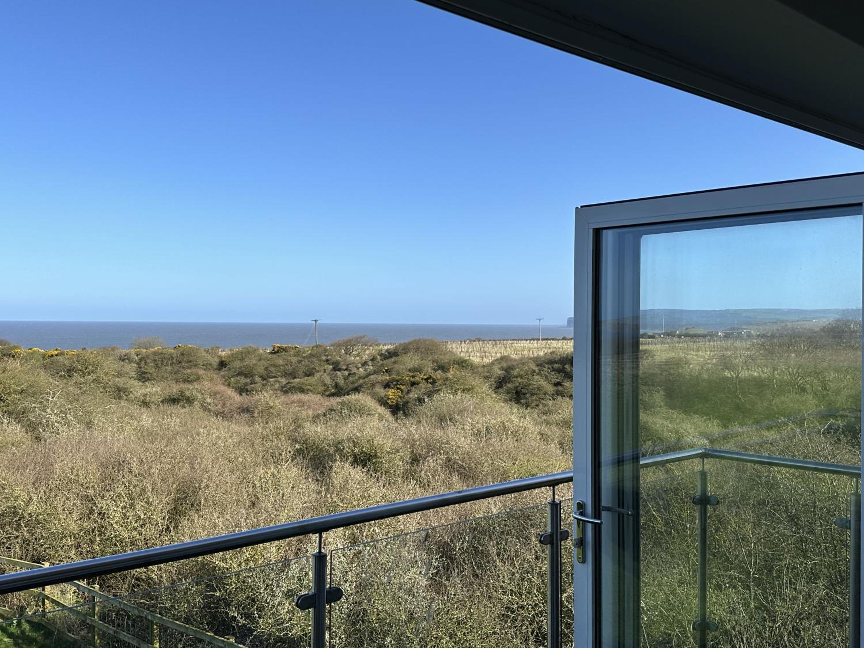 Sunrise View - Balcony and Seaview - Part of the The Bay Filey Holiday Village with pool, gym and direct beach access, pub, restaurant, tennis and meadows