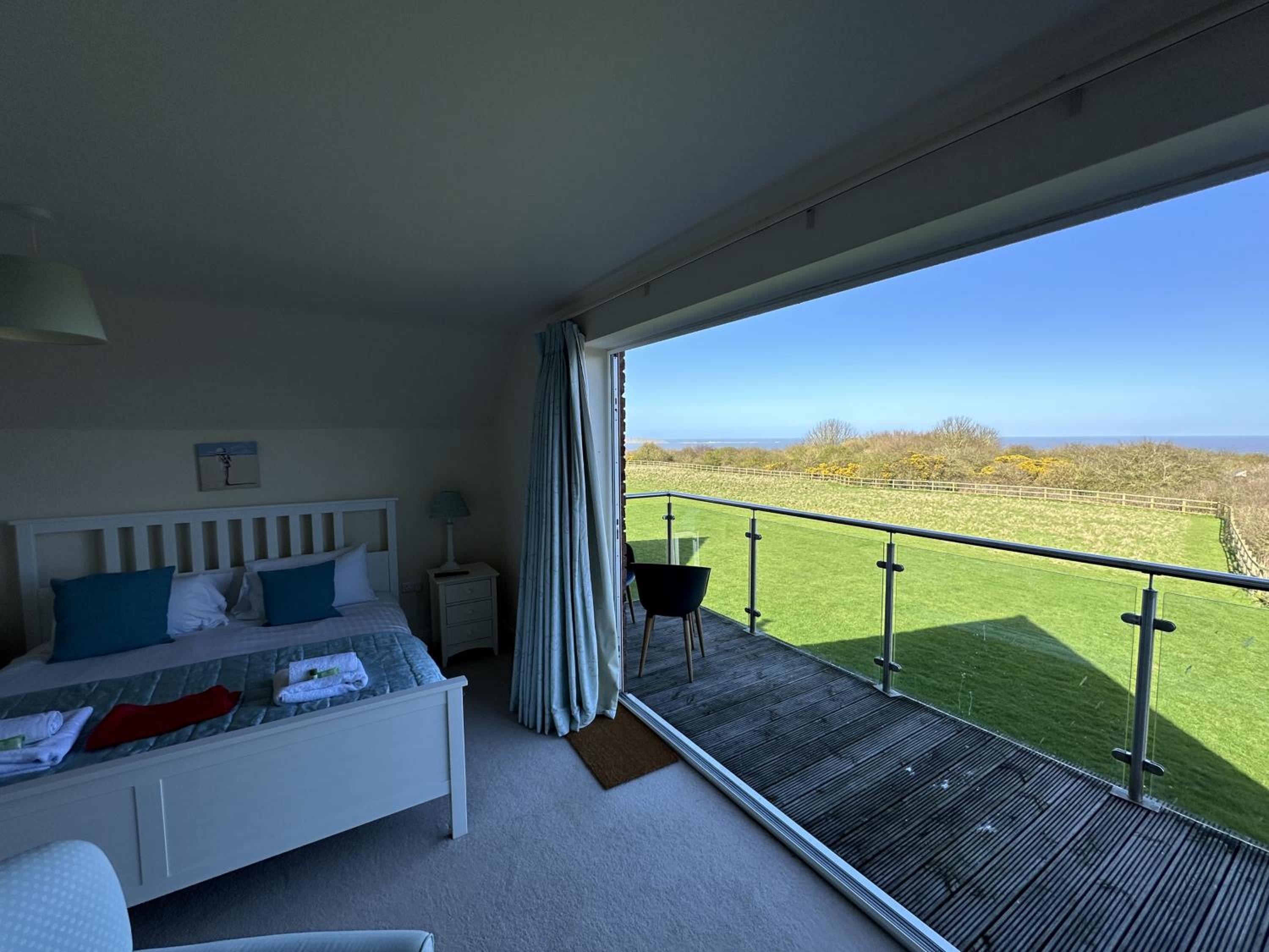 Sunrise View - Balcony and Seaview - Part of the The Bay Filey Holiday Village with pool, gym and direct beach access, pub, restaurant, tennis and meadows