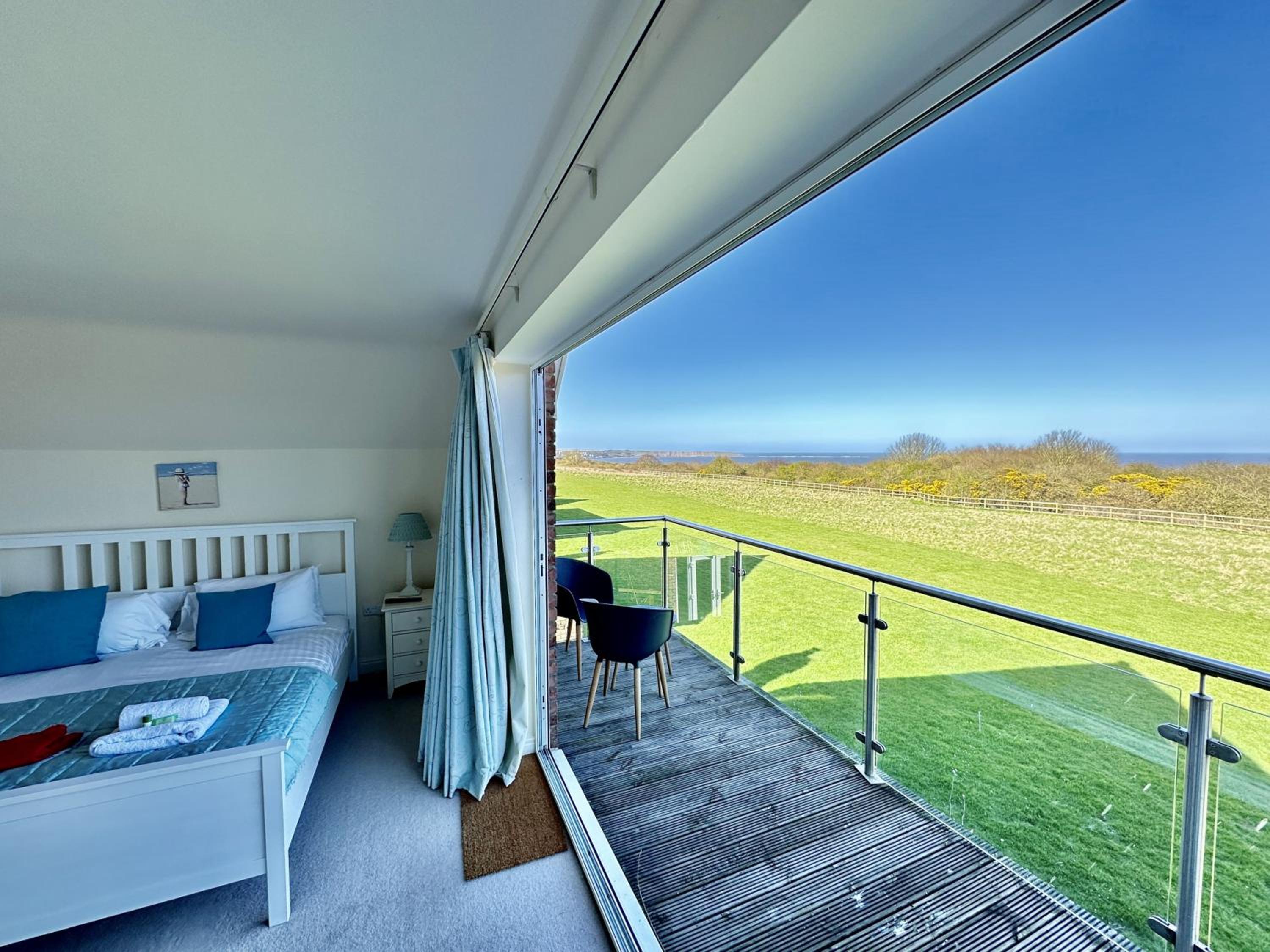 Sunrise View - Balcony and Seaview - Part of the The Bay Filey Holiday Village with pool, gym and direct beach access, pub, restaurant, tennis and meadows