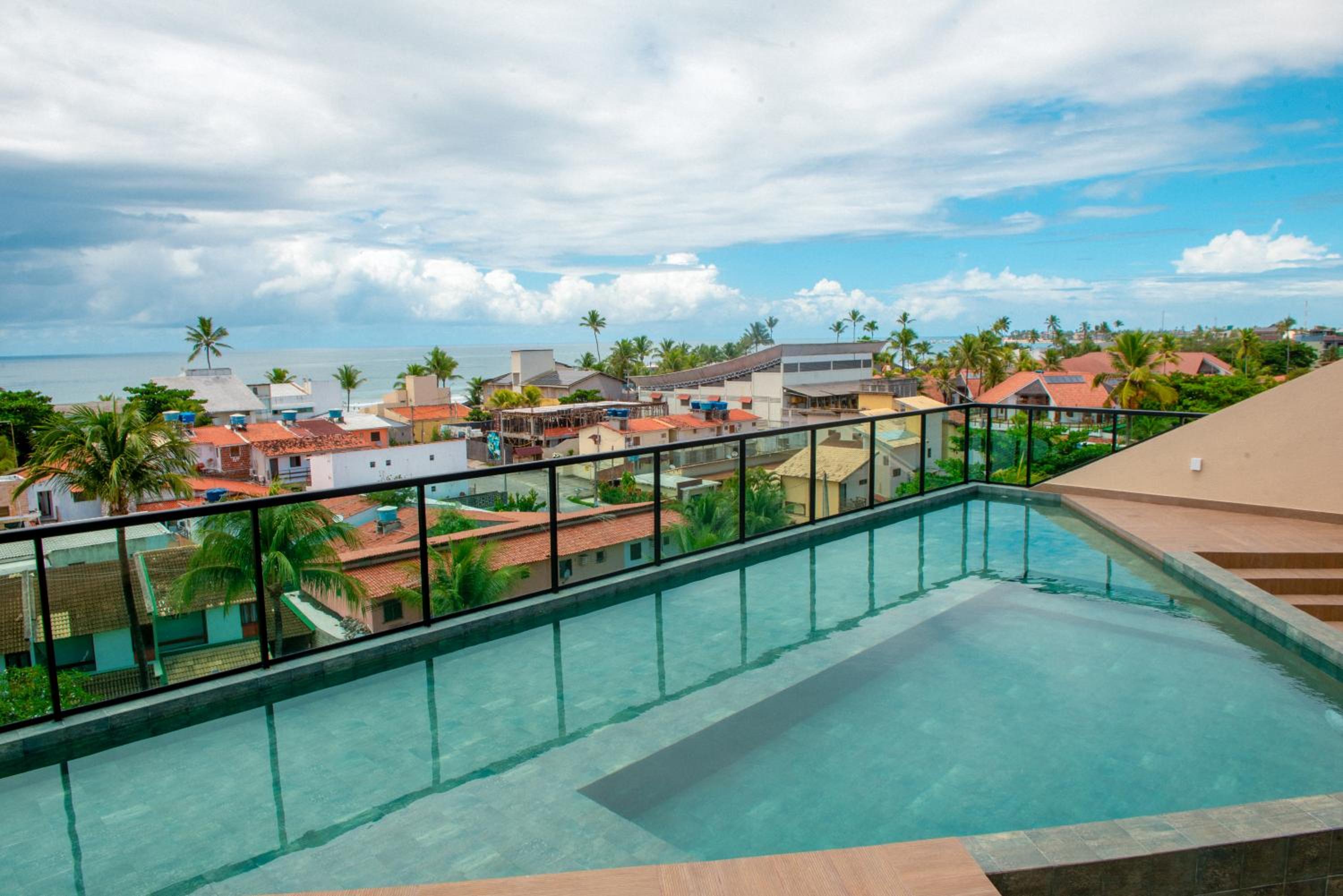 Apto com vista para o mar, Rooftop com piscina & sauna em Porto de Galinhas