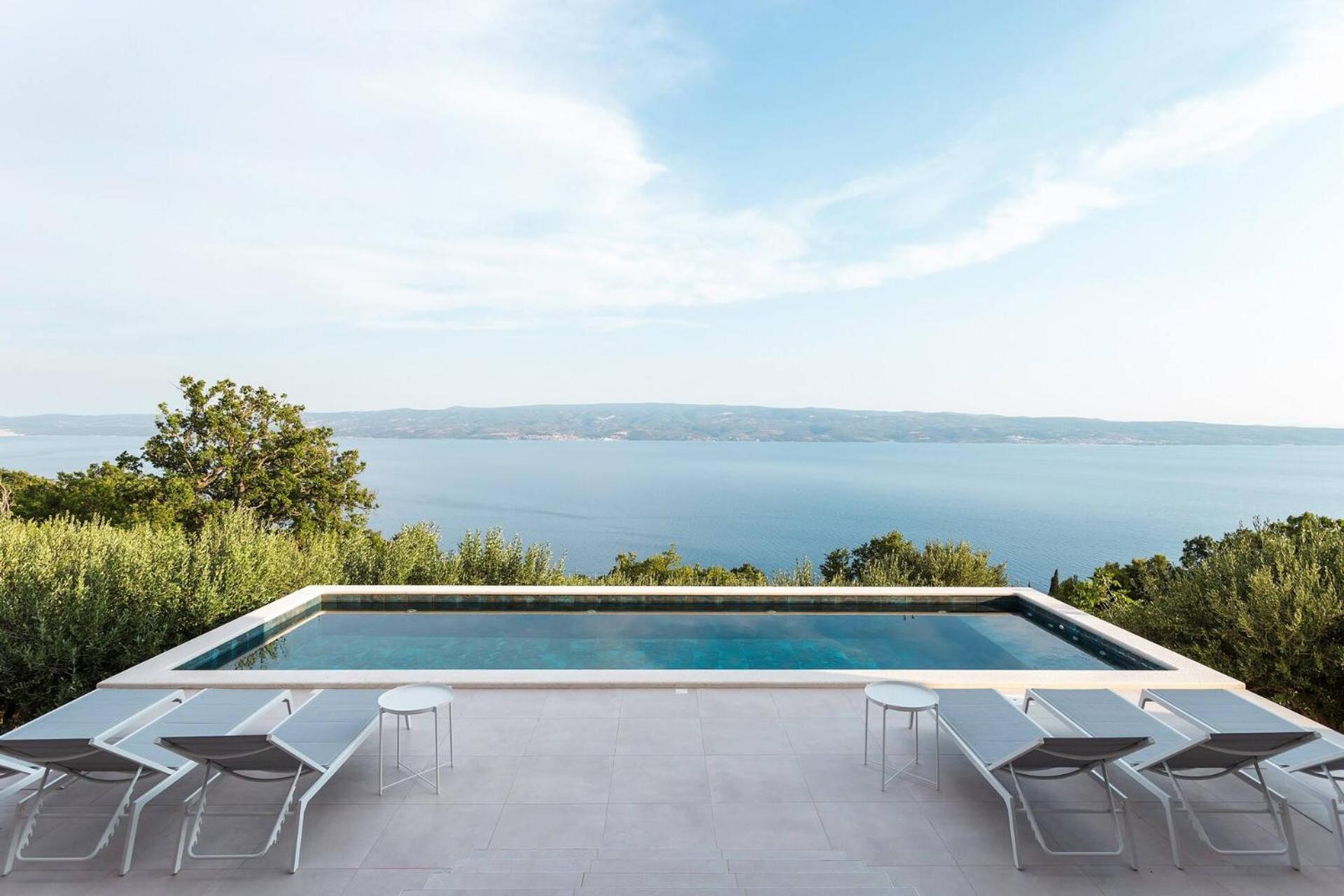 Luxury Villa Ovation heated pool sea view view 3
