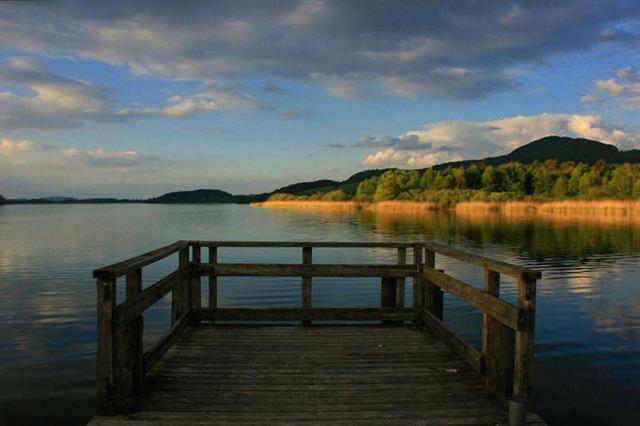 Exklusives Seehaus LAKEHOUSE in Bestlage mit privaten Sandstrand und eigenem Boot und SUP