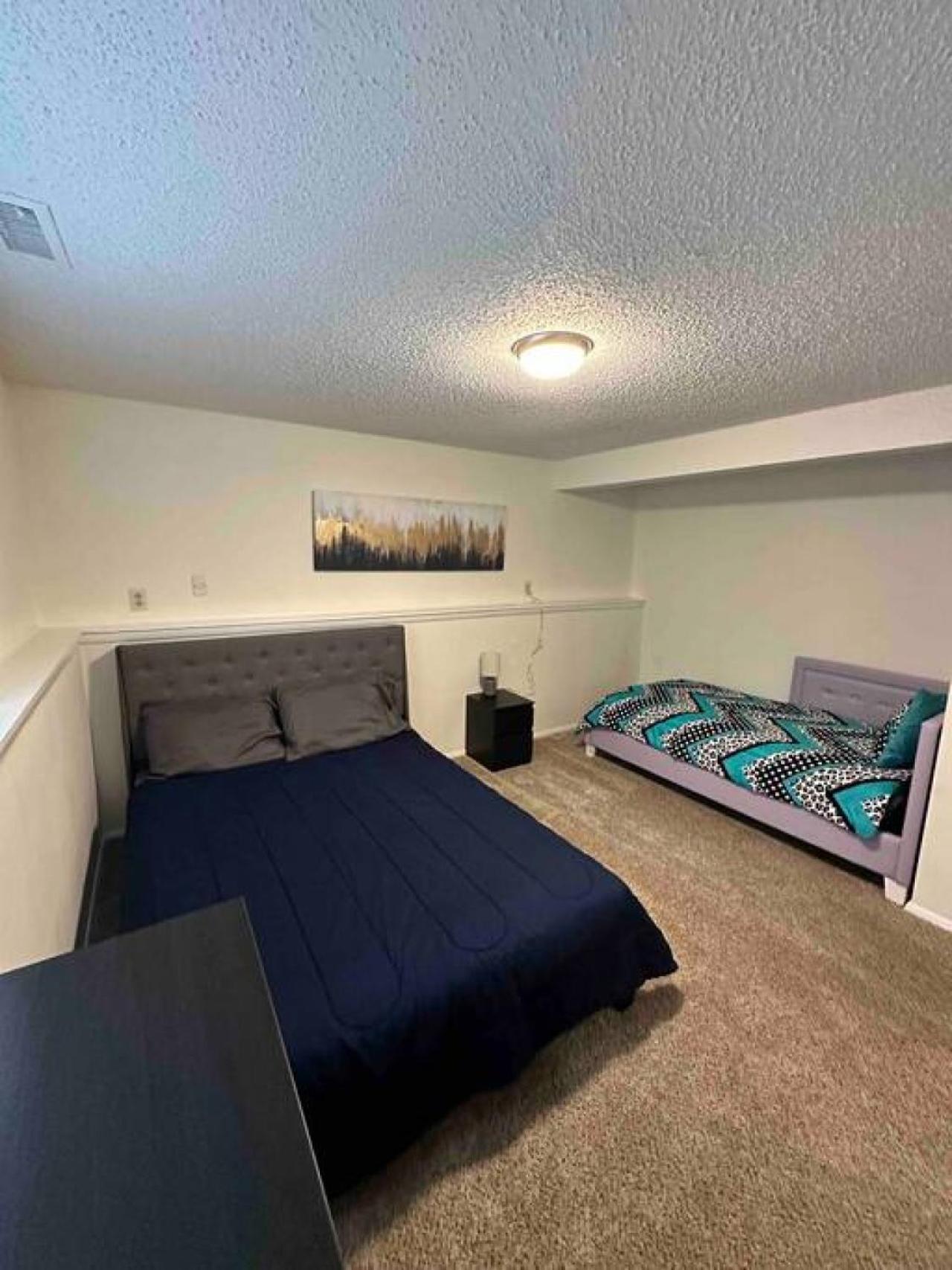 Charlotte Vacations - Escape to Tranquility in our Spacious 4-Bedroom Retreat - Property Image 10