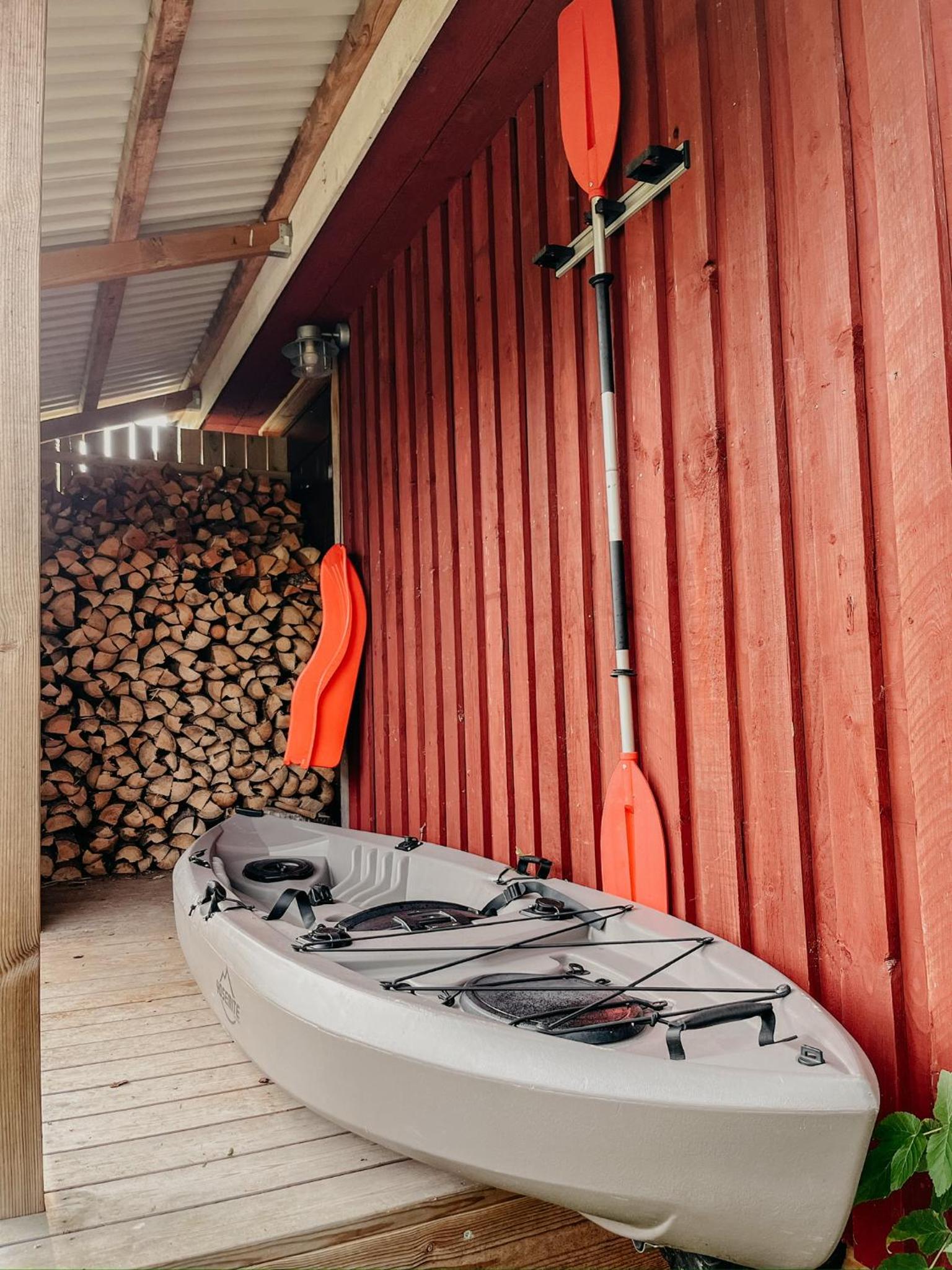 Luxurious red cottage with wood stove near lake view 4